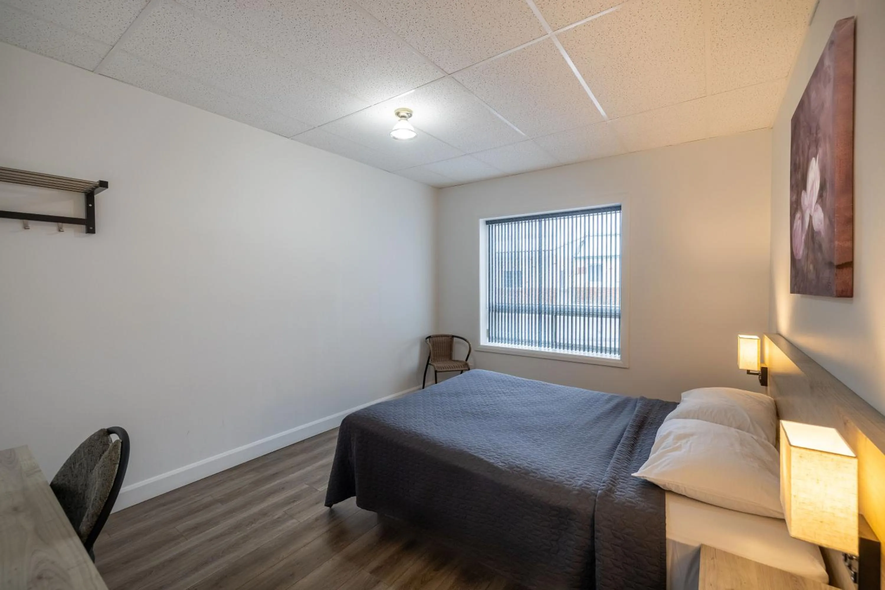 Bed in Motel Et Condo Chez Charley