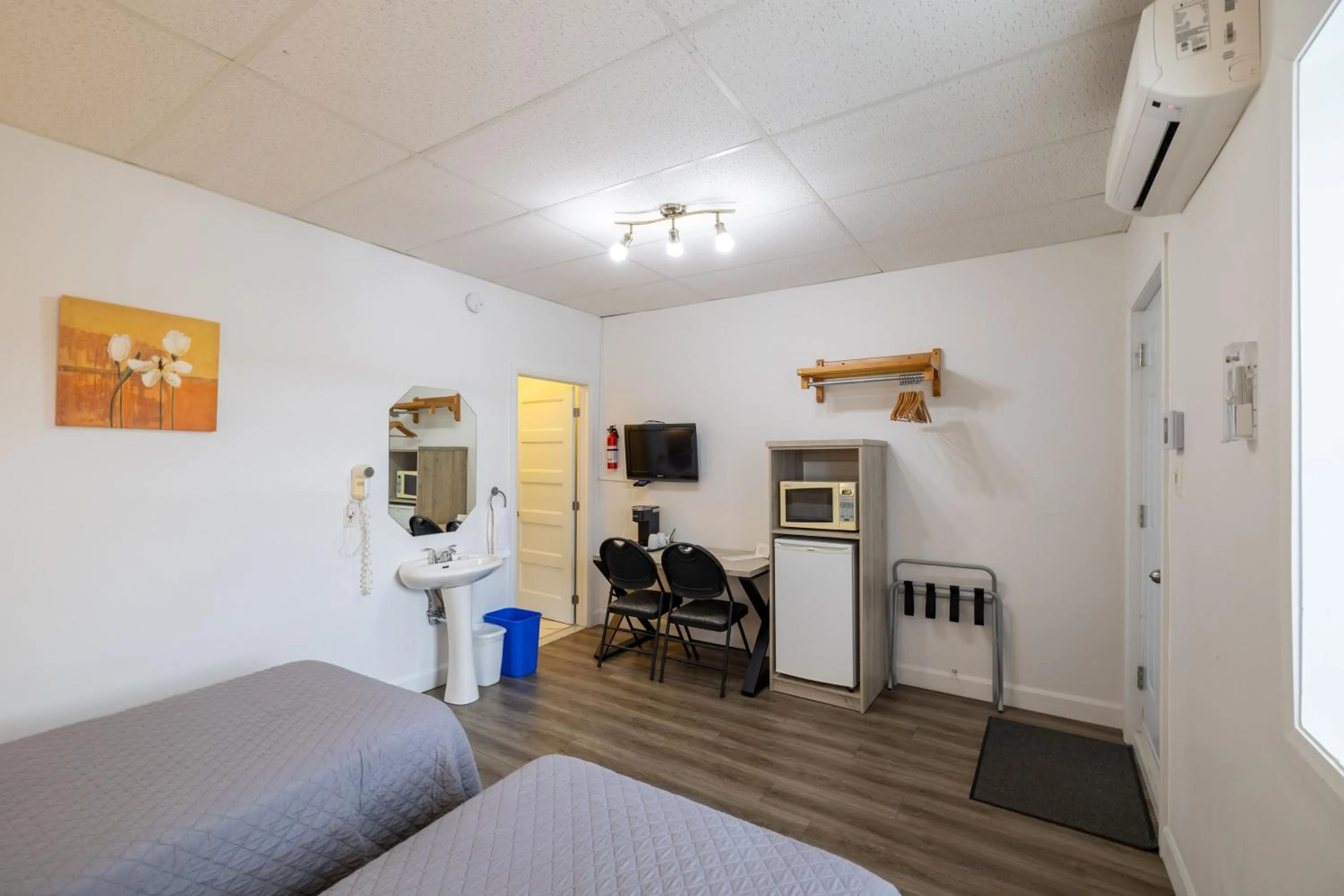 Bedroom in Motel Et Condo Chez Charley