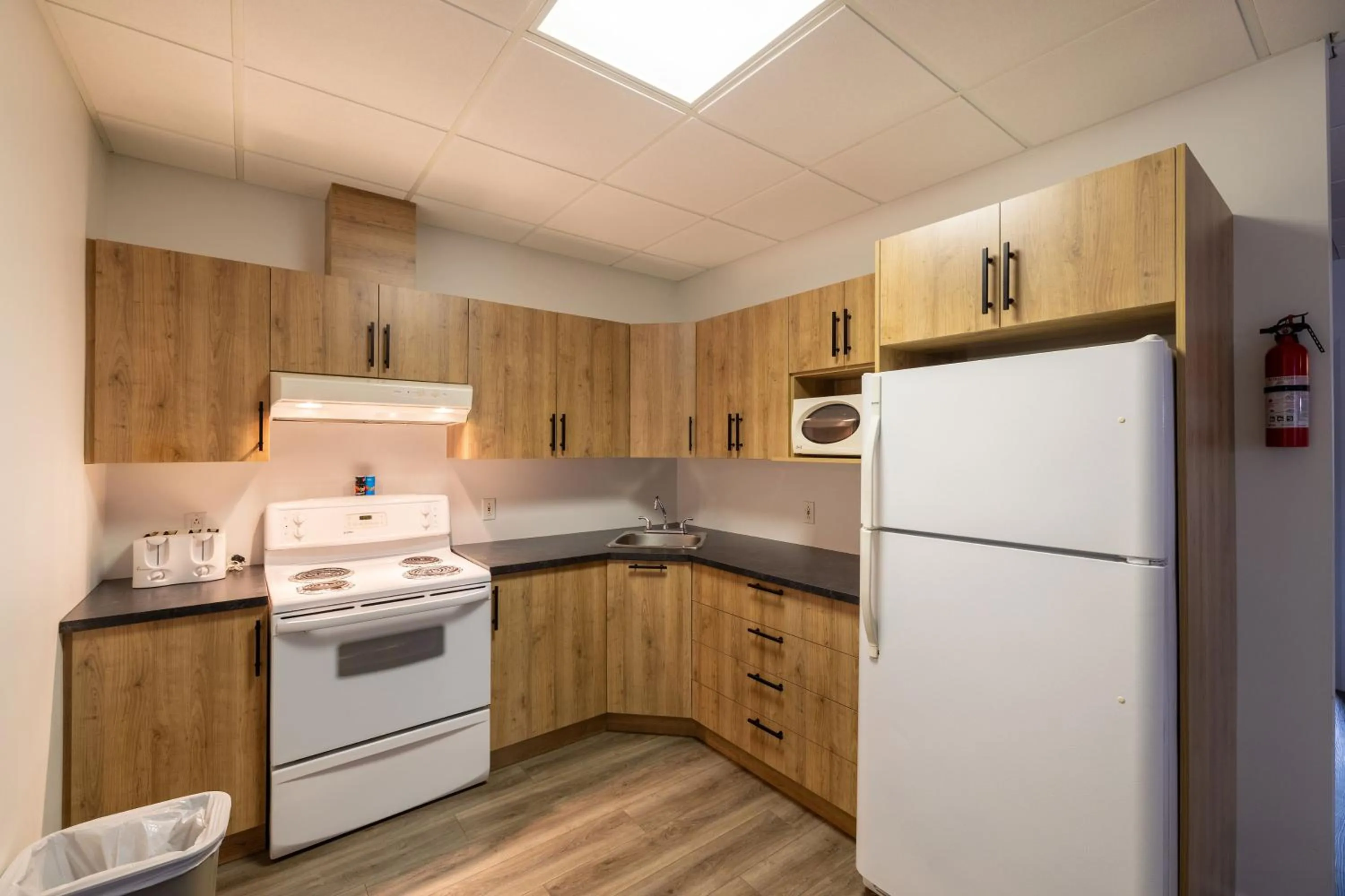 Kitchen or kitchenette in Motel Et Condo Chez Charley
