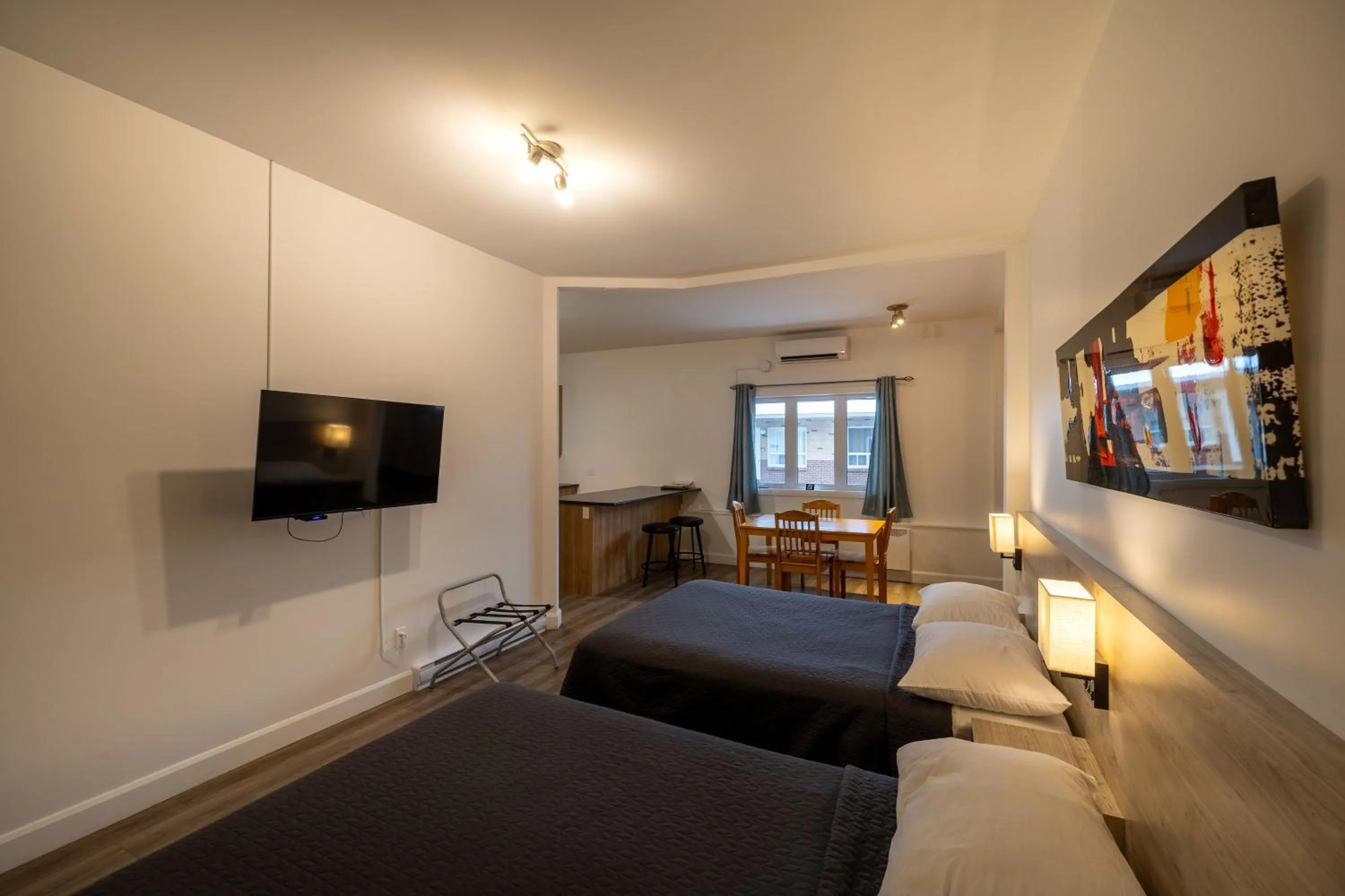 Bed in Motel Et Condo Chez Charley