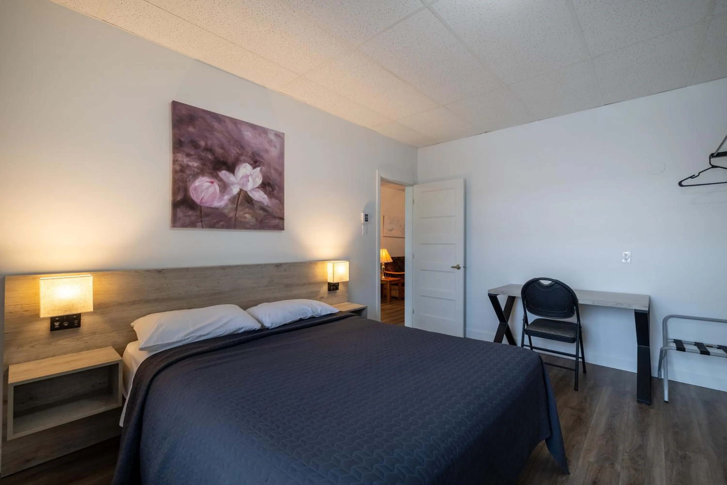 Bed in Motel Et Condo Chez Charley