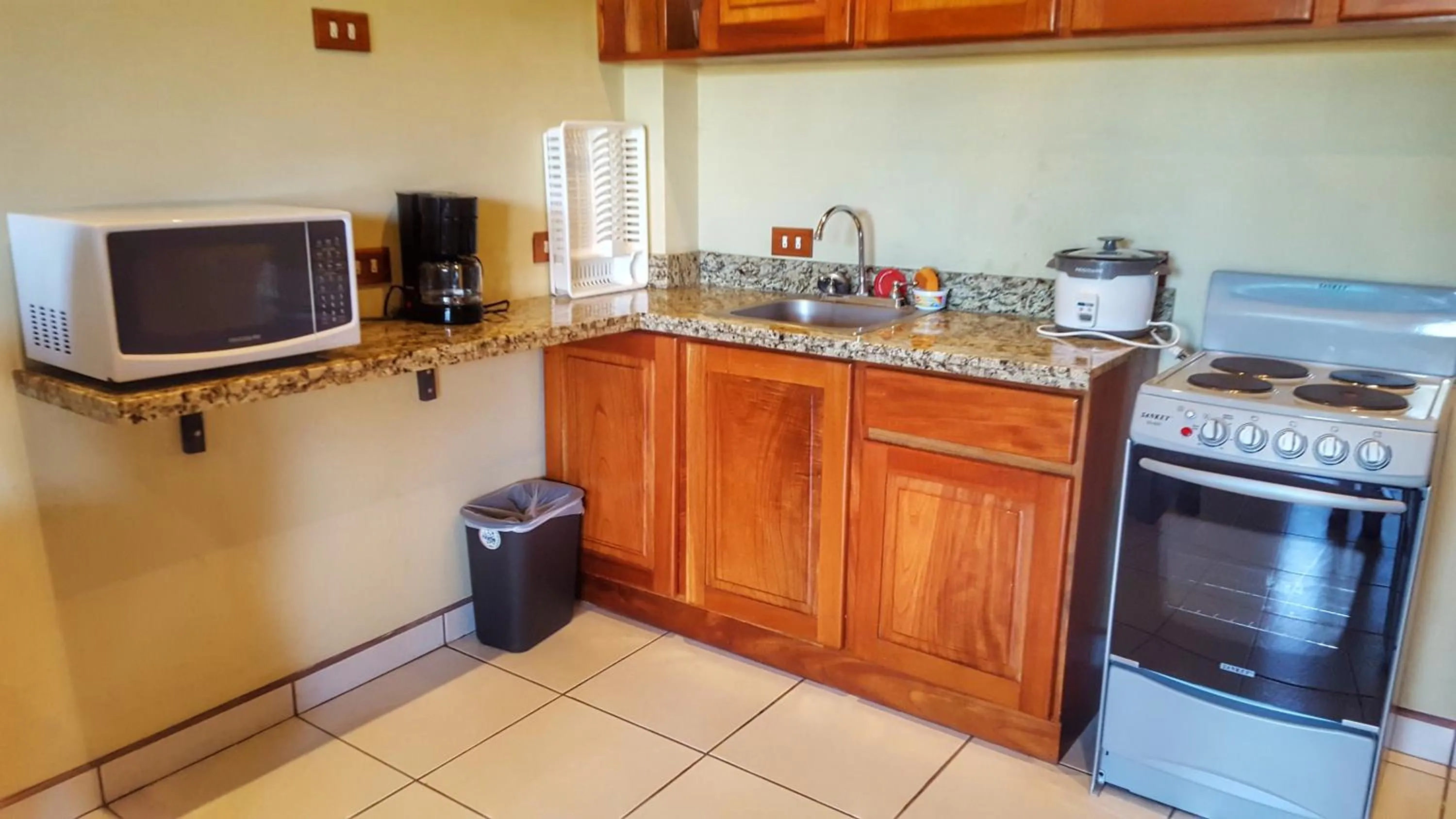 Kitchen or kitchenette in Pacifico Loft Hotel