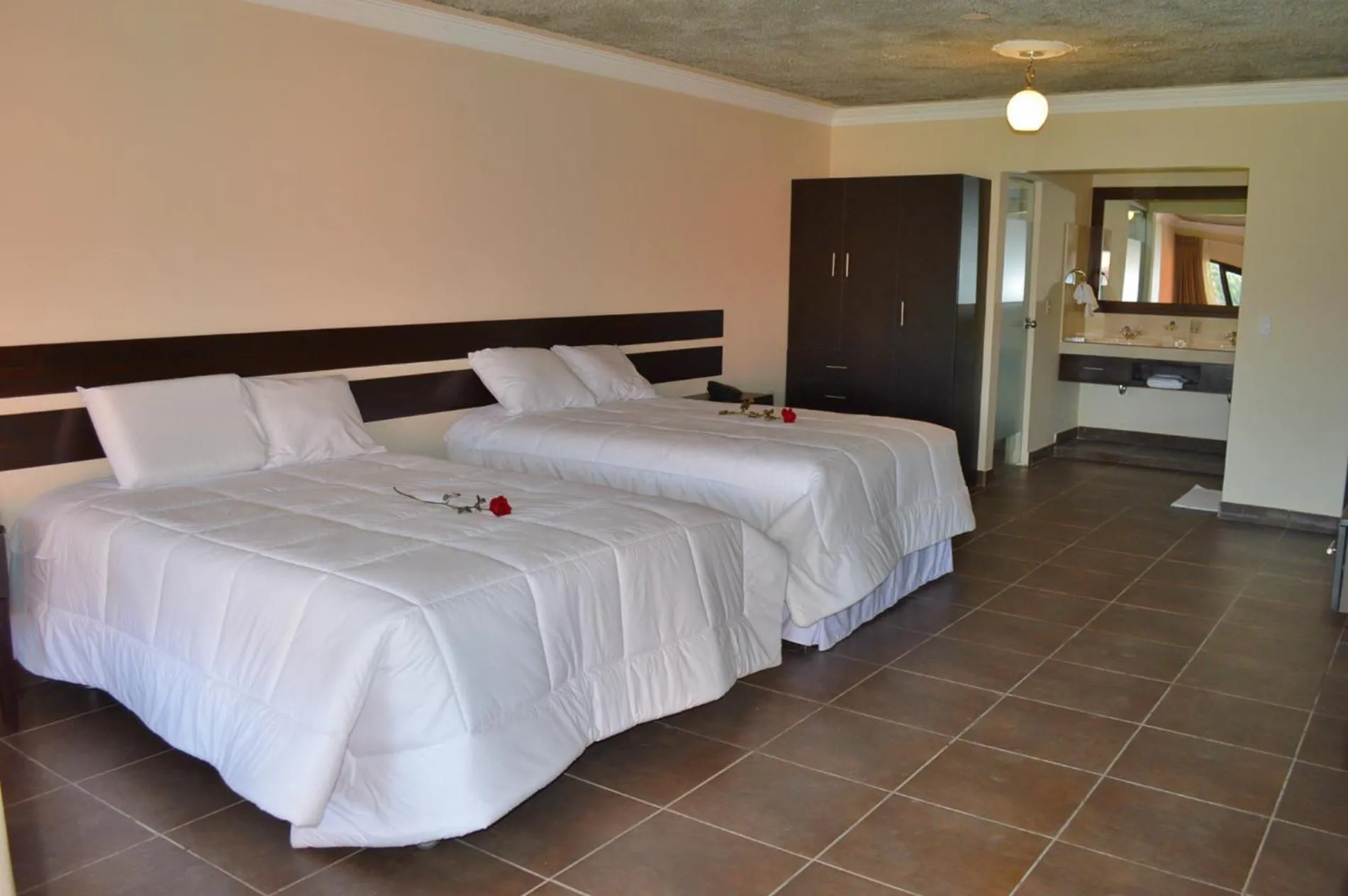 Property building, Bed in Hacienda San Juan Resort