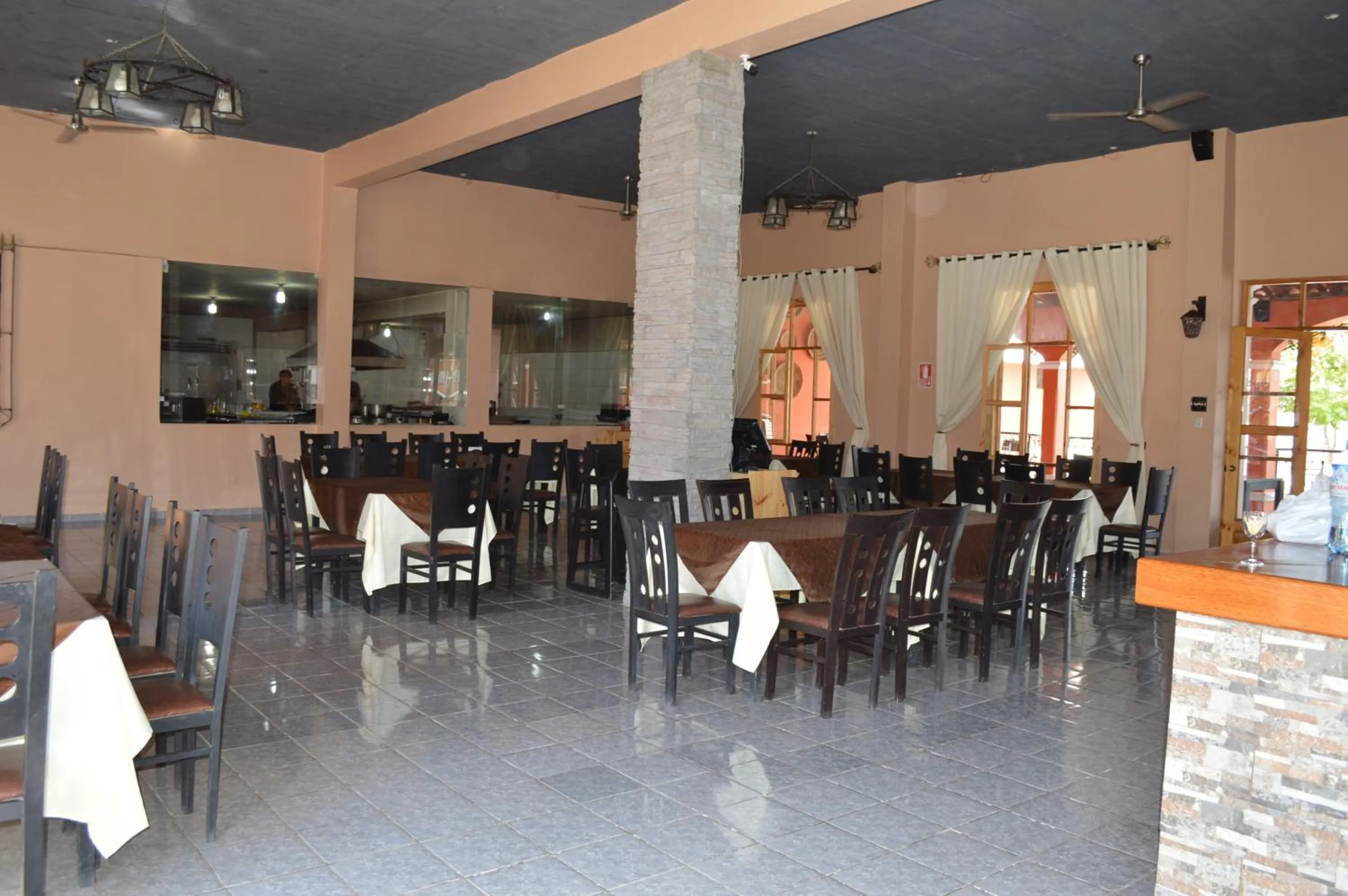 Communal lounge/ TV room in Hacienda San Juan Resort