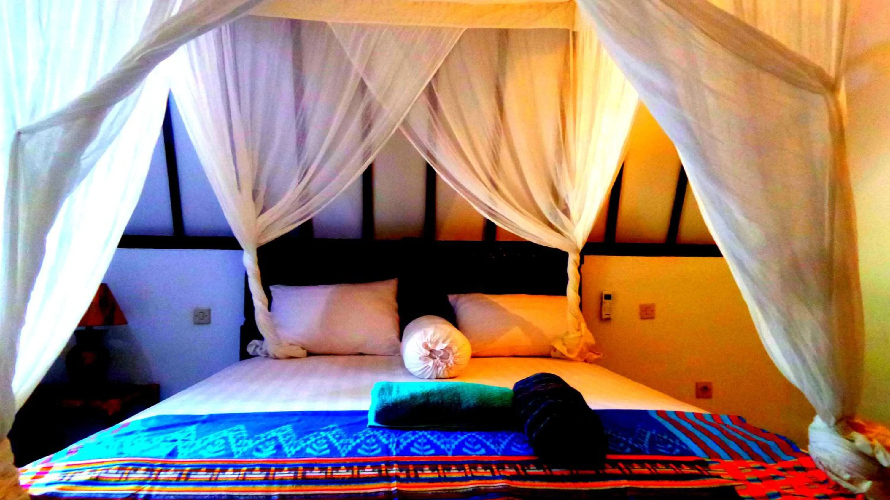 Bed in Ina Gili Guesthouse