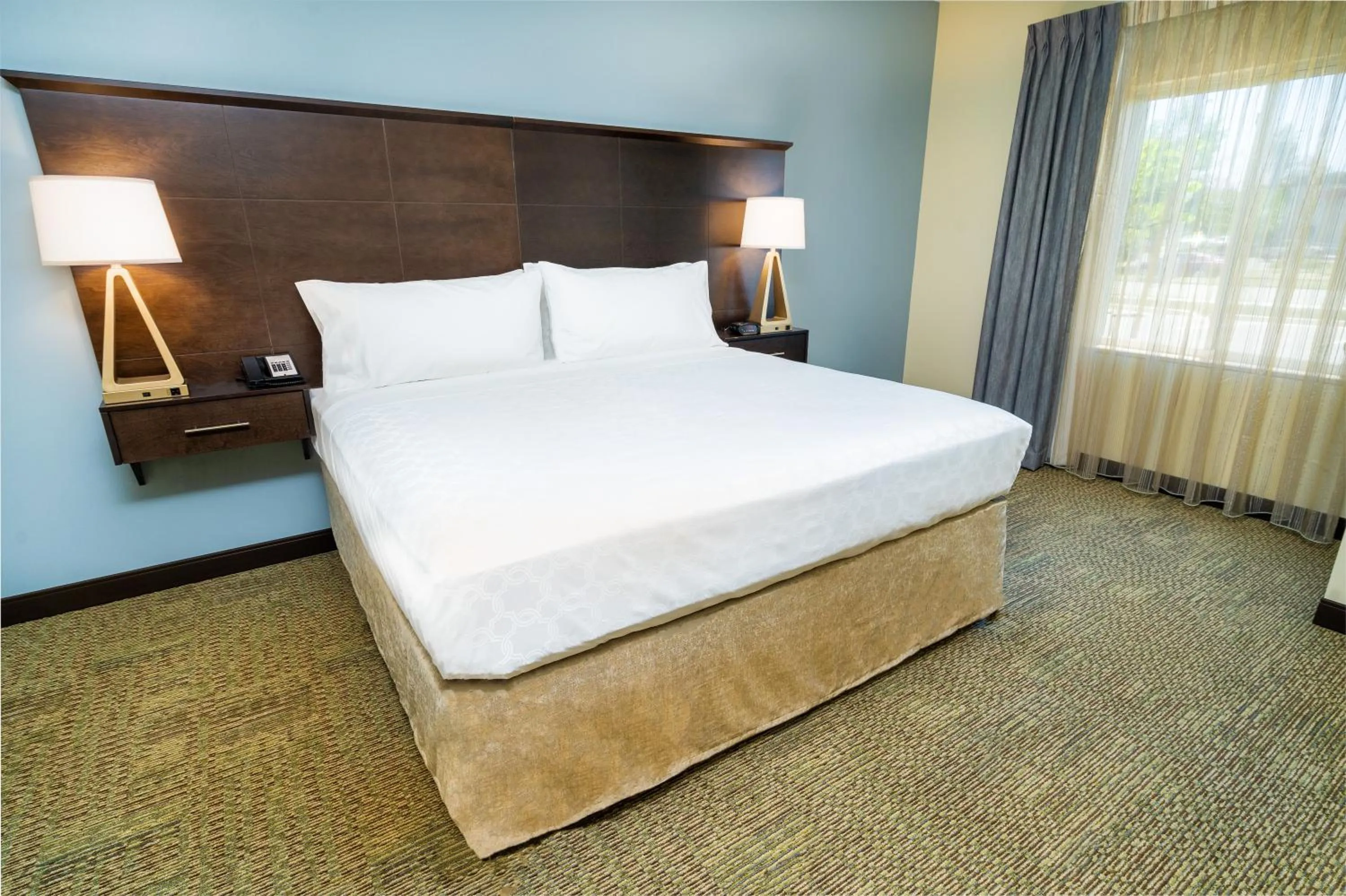 Bed in Staybridge Suites Corona South by IHG