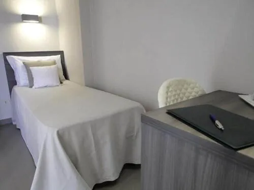 Bed in Hotel Crystal