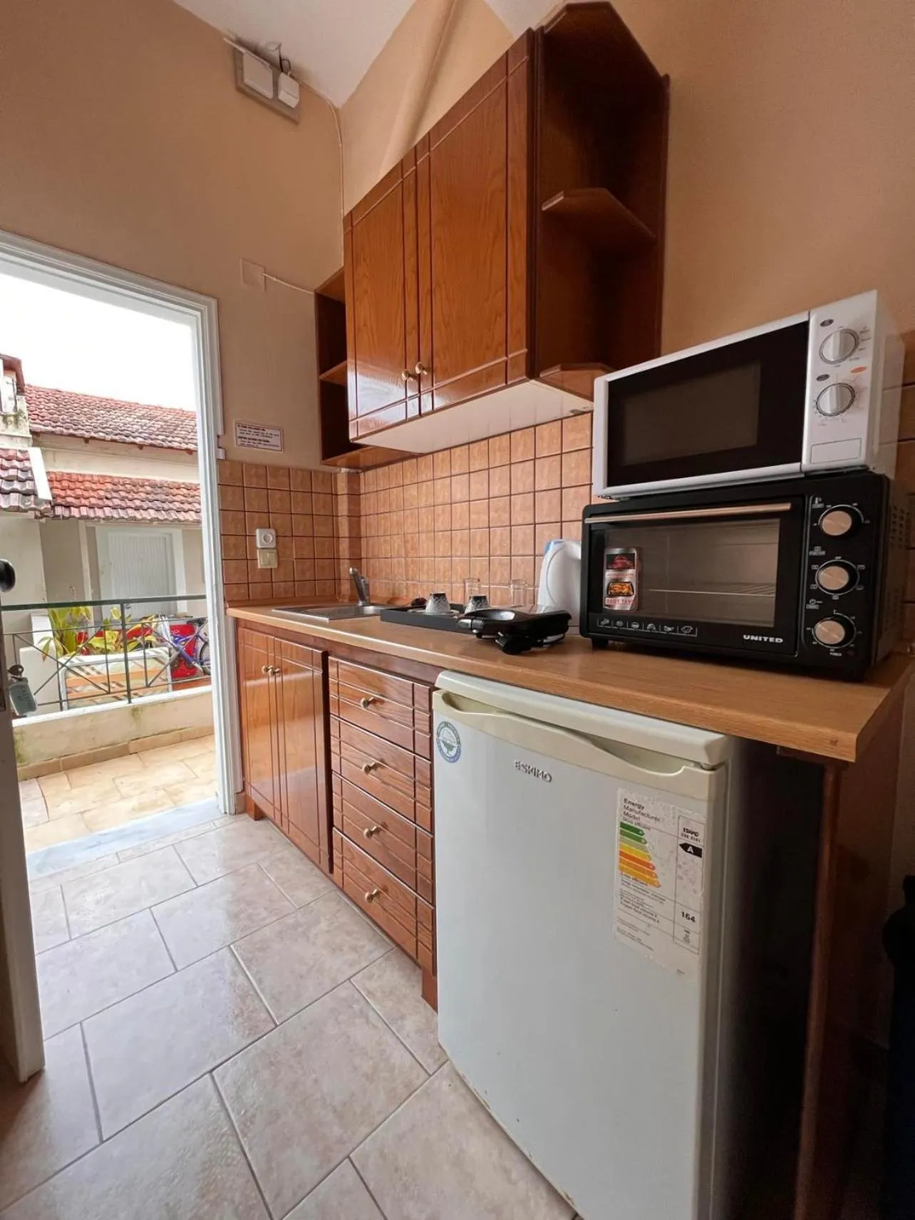 Kitchen or kitchenette in Kalypso studio Resorts