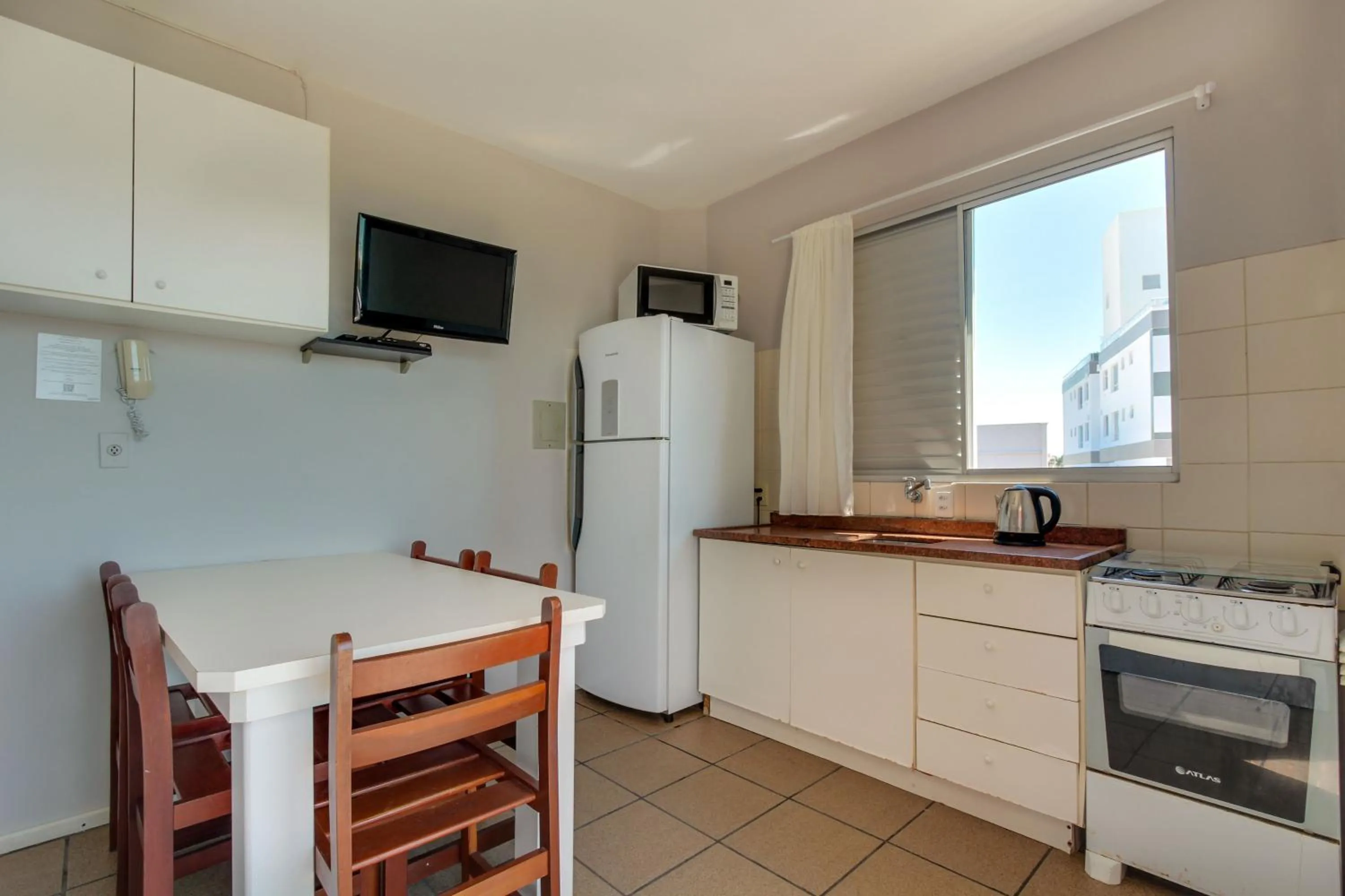Kitchen or kitchenette in Imigrantes Apart Hotel