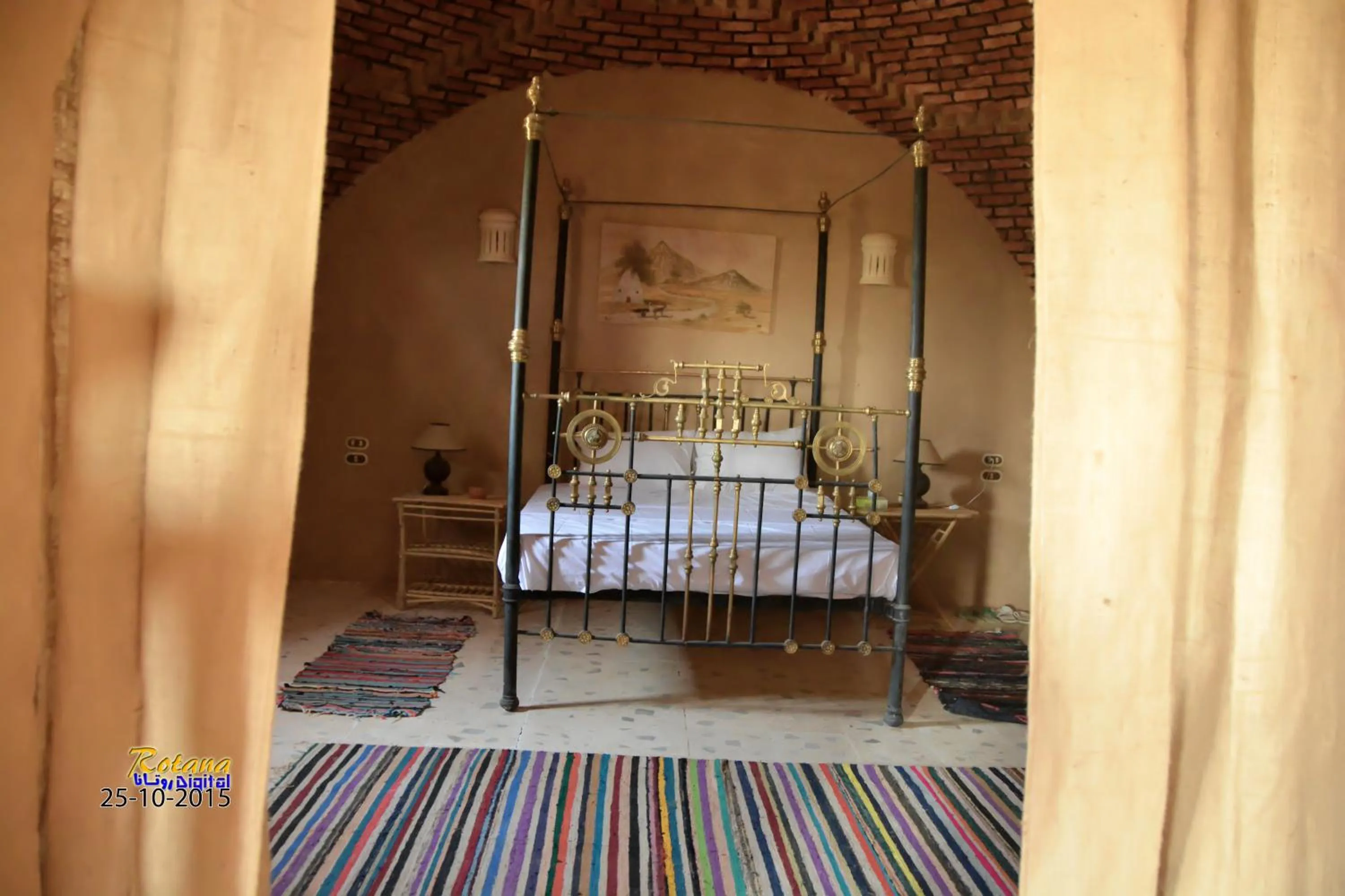Bed in Qasr El Bagawat Hotel