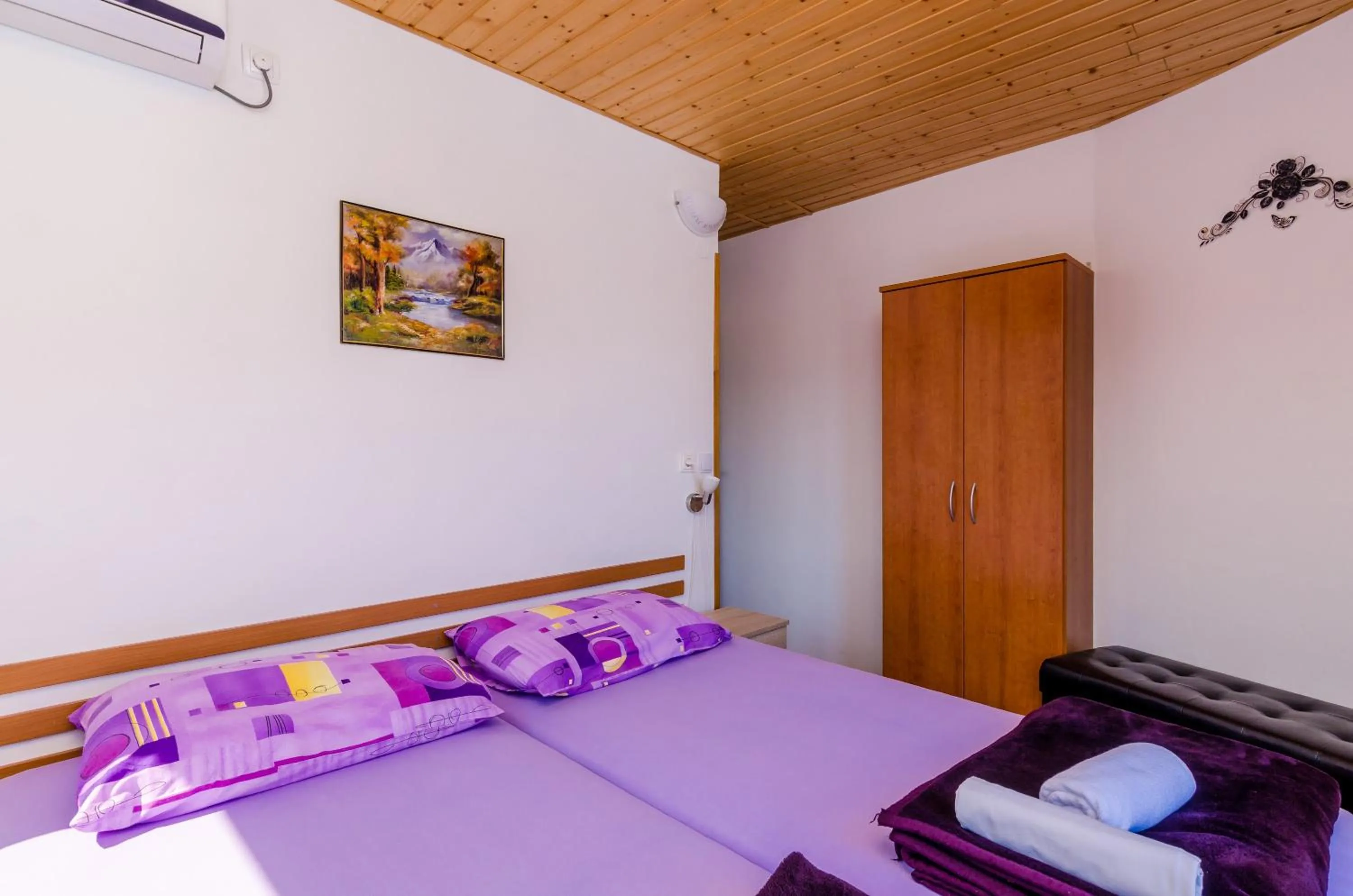 Bedroom, Bed in Apartments & Rooms Mihajica