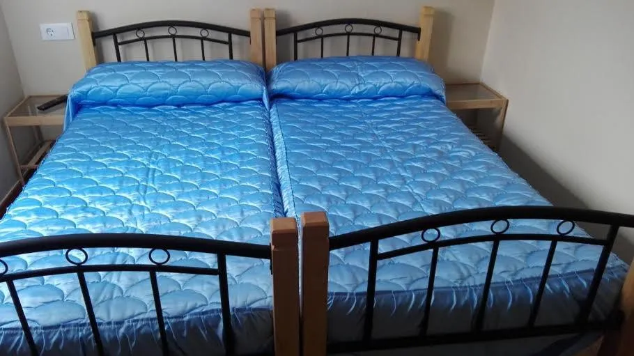 Bedroom in Albergue La Casona Del Peregrino