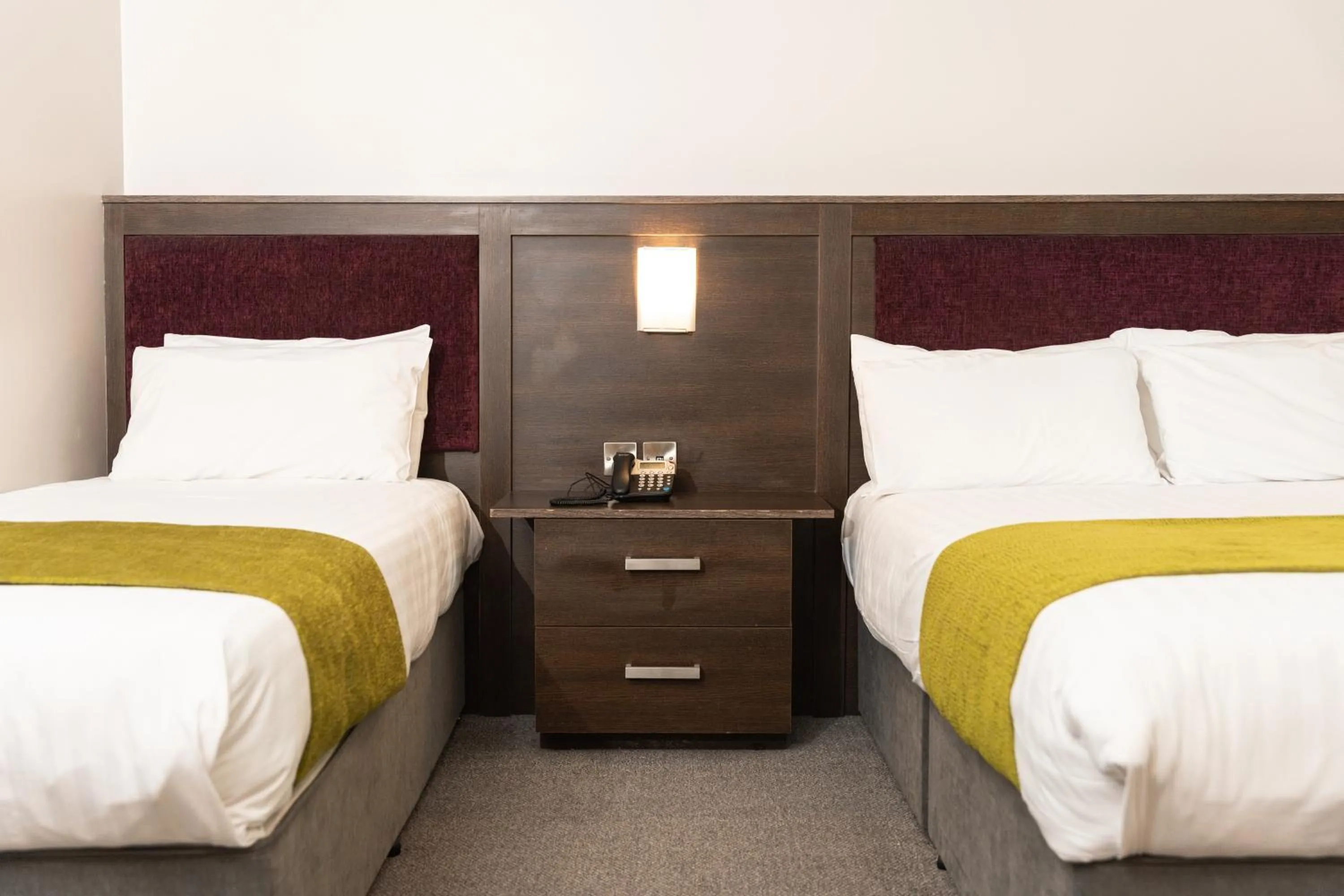 Bed in Waterfoot Hotel