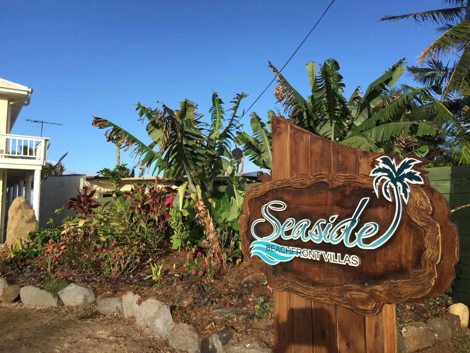 Property logo or sign in Seaside Beachfront Villas Rarotonga