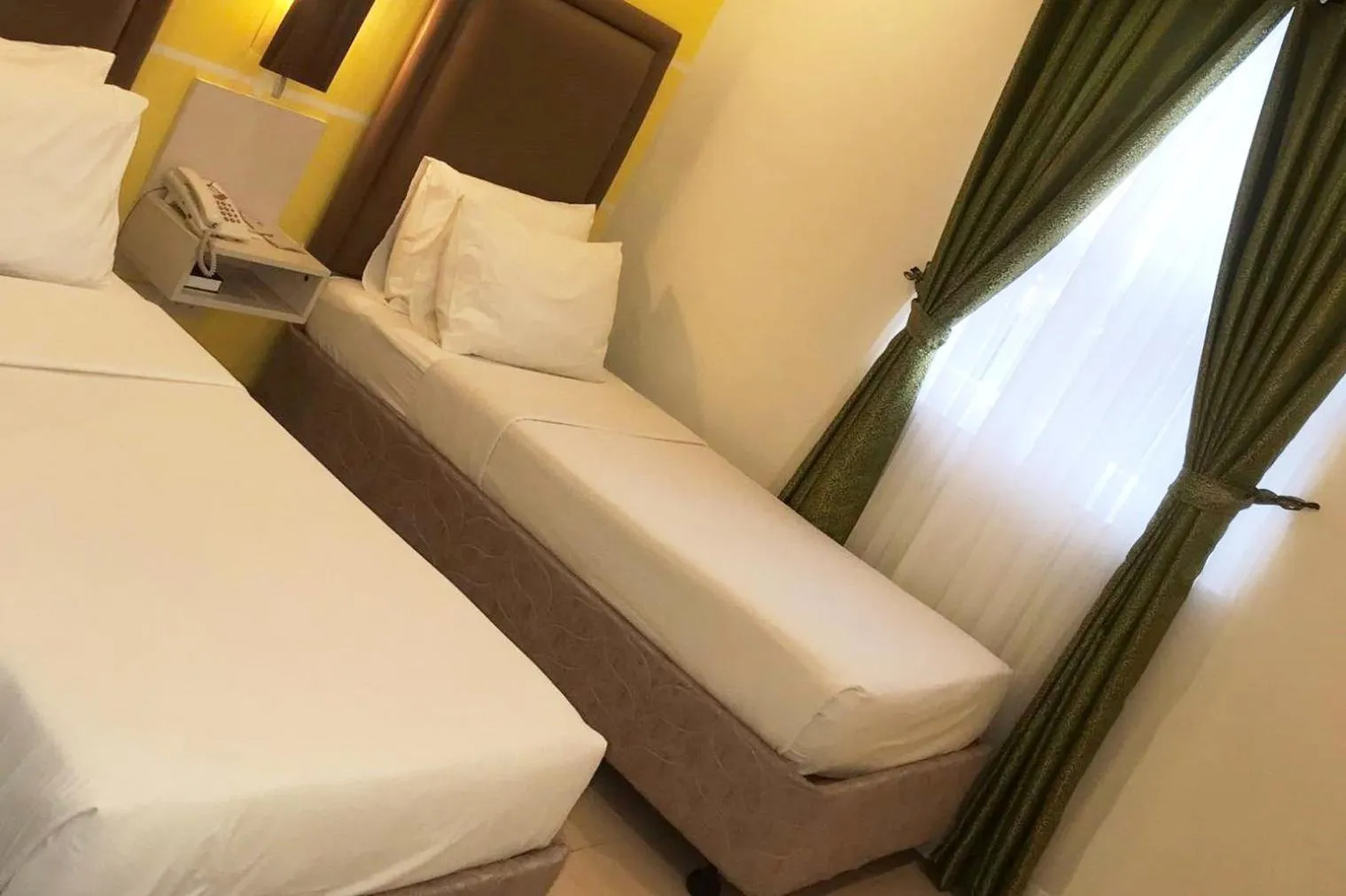 Bed in Cebu Uncle Toms Cabin Hotel powered by Cocotel