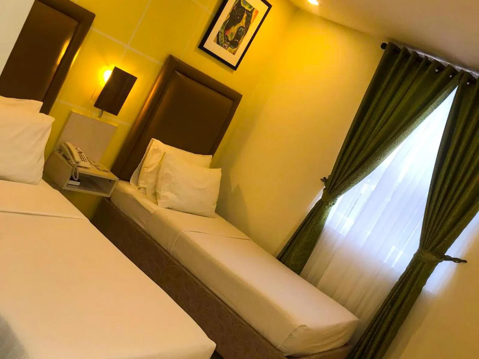 Photo of the whole room, Bed in Cebu Uncle Toms Cabin Hotel powered by Cocotel