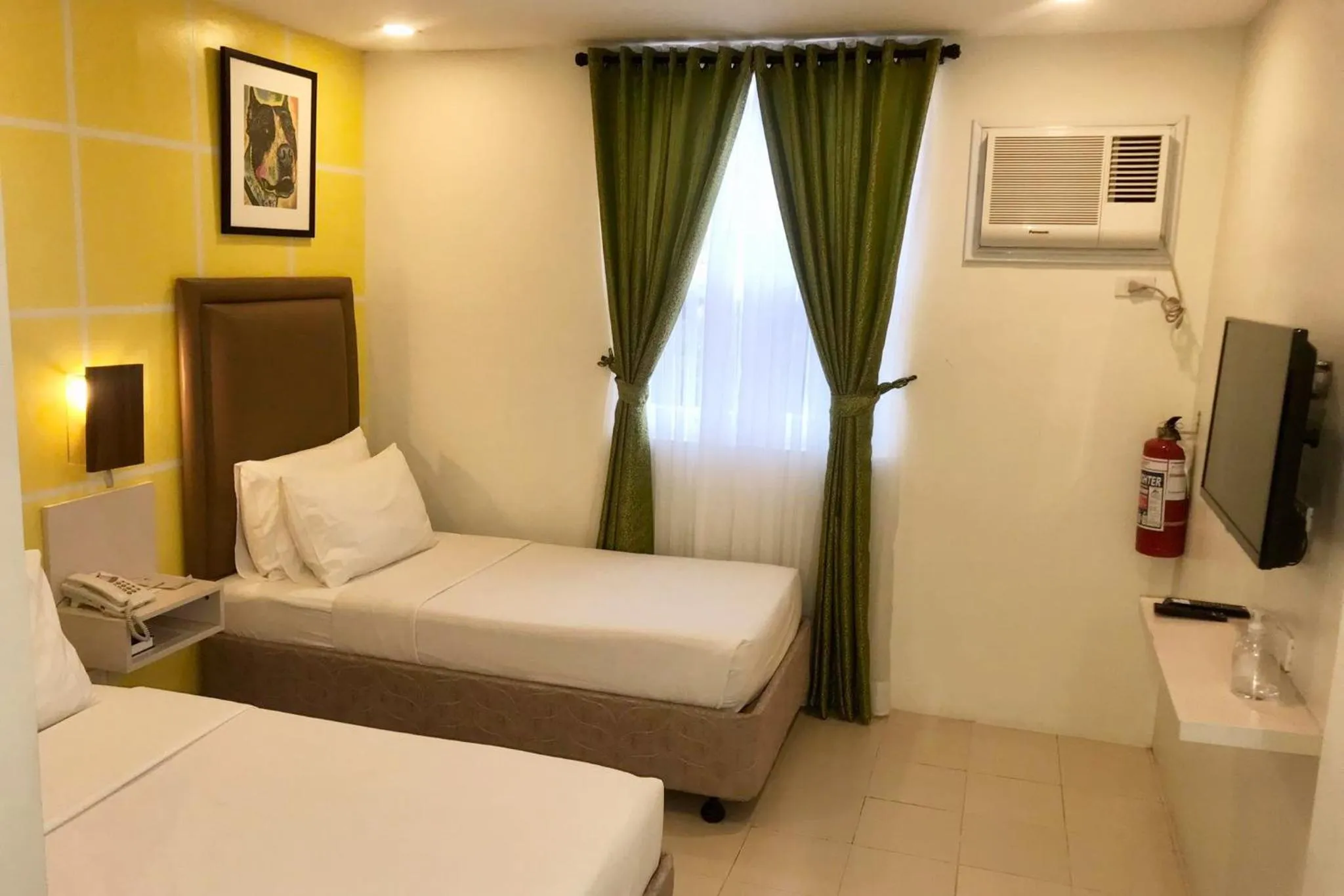 Bed in Cebu Uncle Toms Cabin Hotel powered by Cocotel