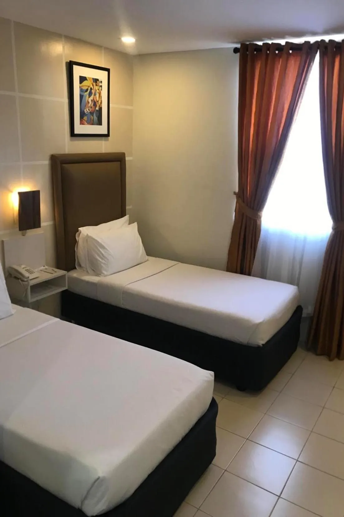 Bed in Cebu Uncle Toms Cabin Hotel powered by Cocotel