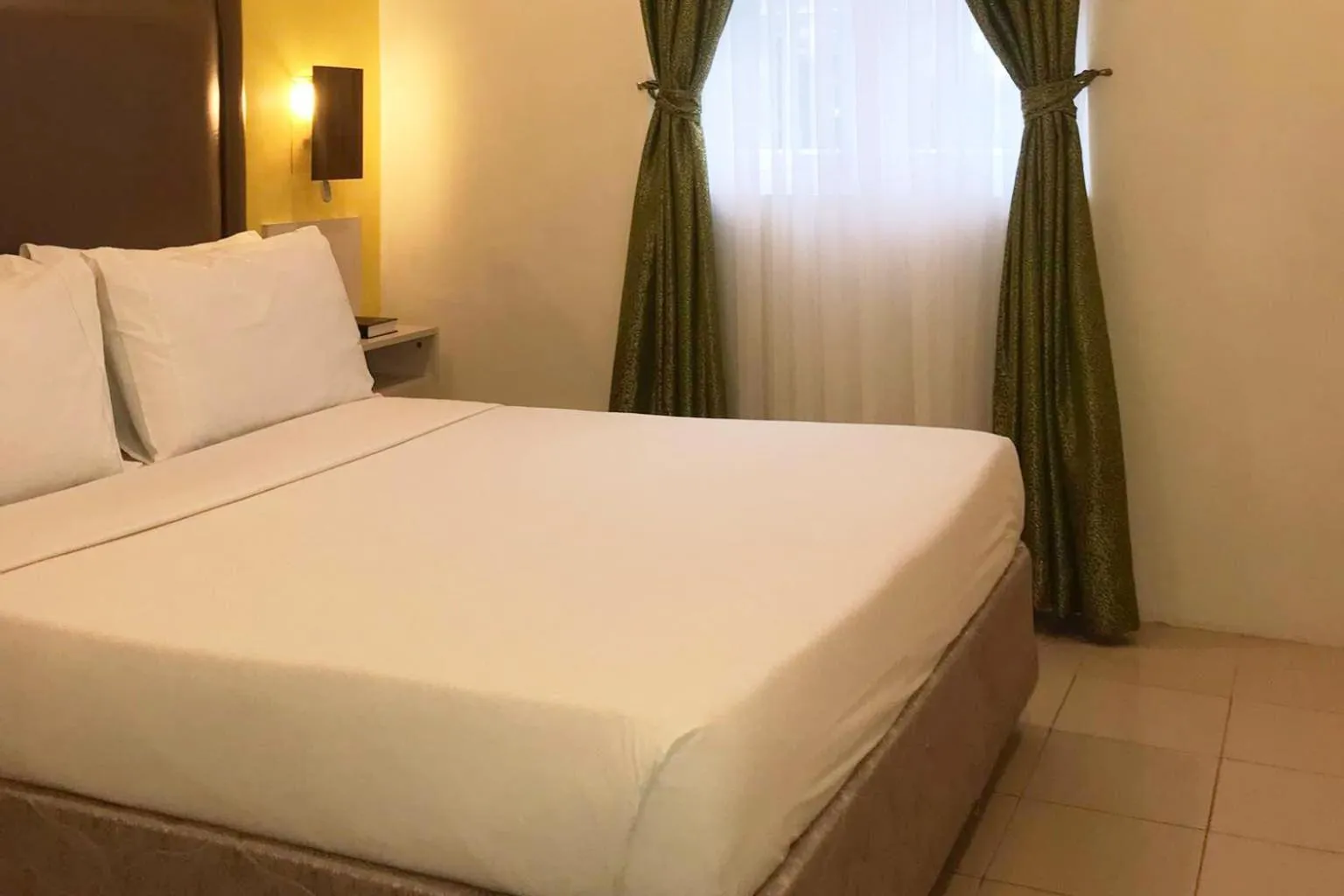 Bed in Cebu Uncle Toms Cabin Hotel powered by Cocotel