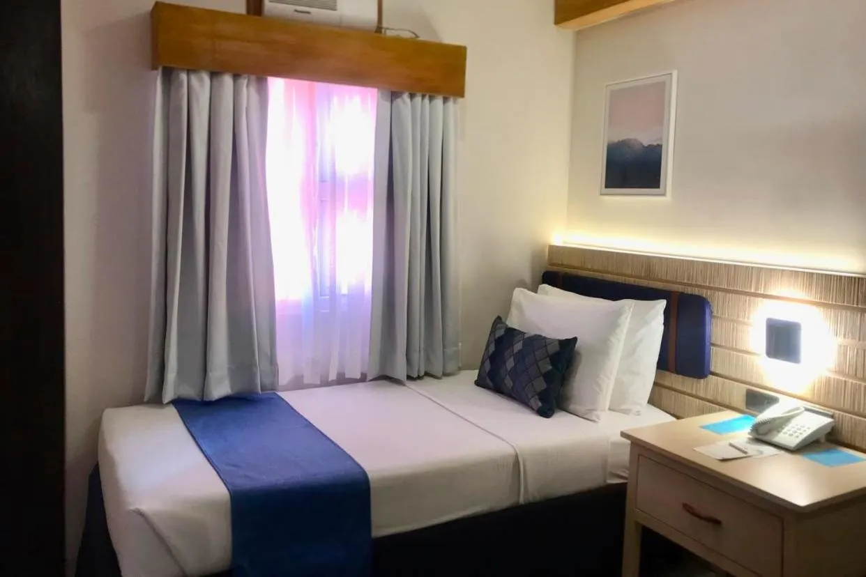 Bed in Cebu Uncle Toms Cabin Hotel powered by Cocotel