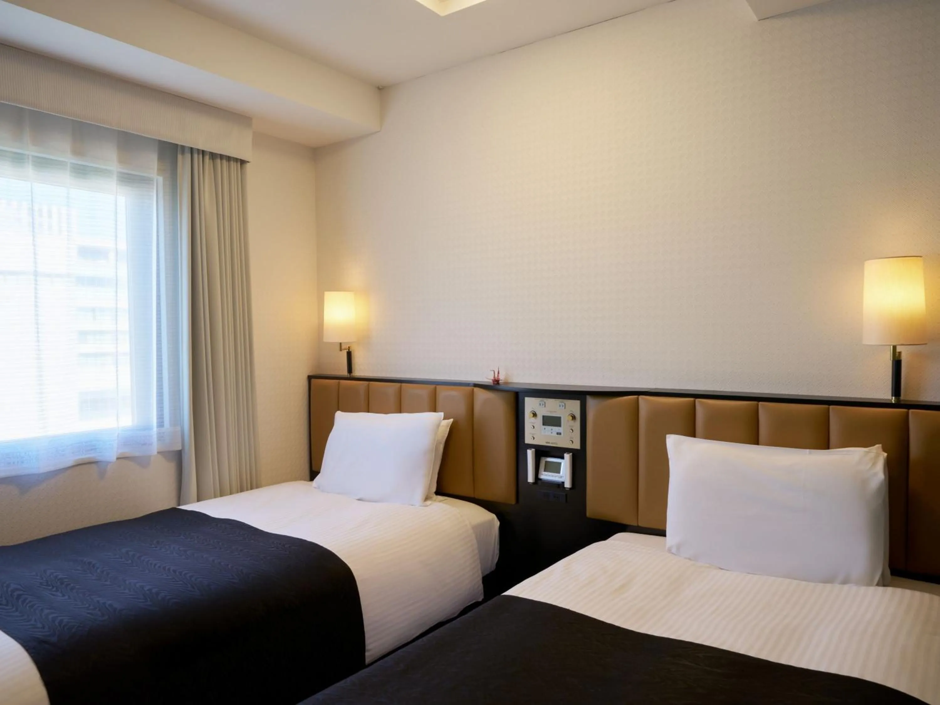 Photo of the whole room, Bed in APA Hotel Hiroshima Ekimae Ohashi