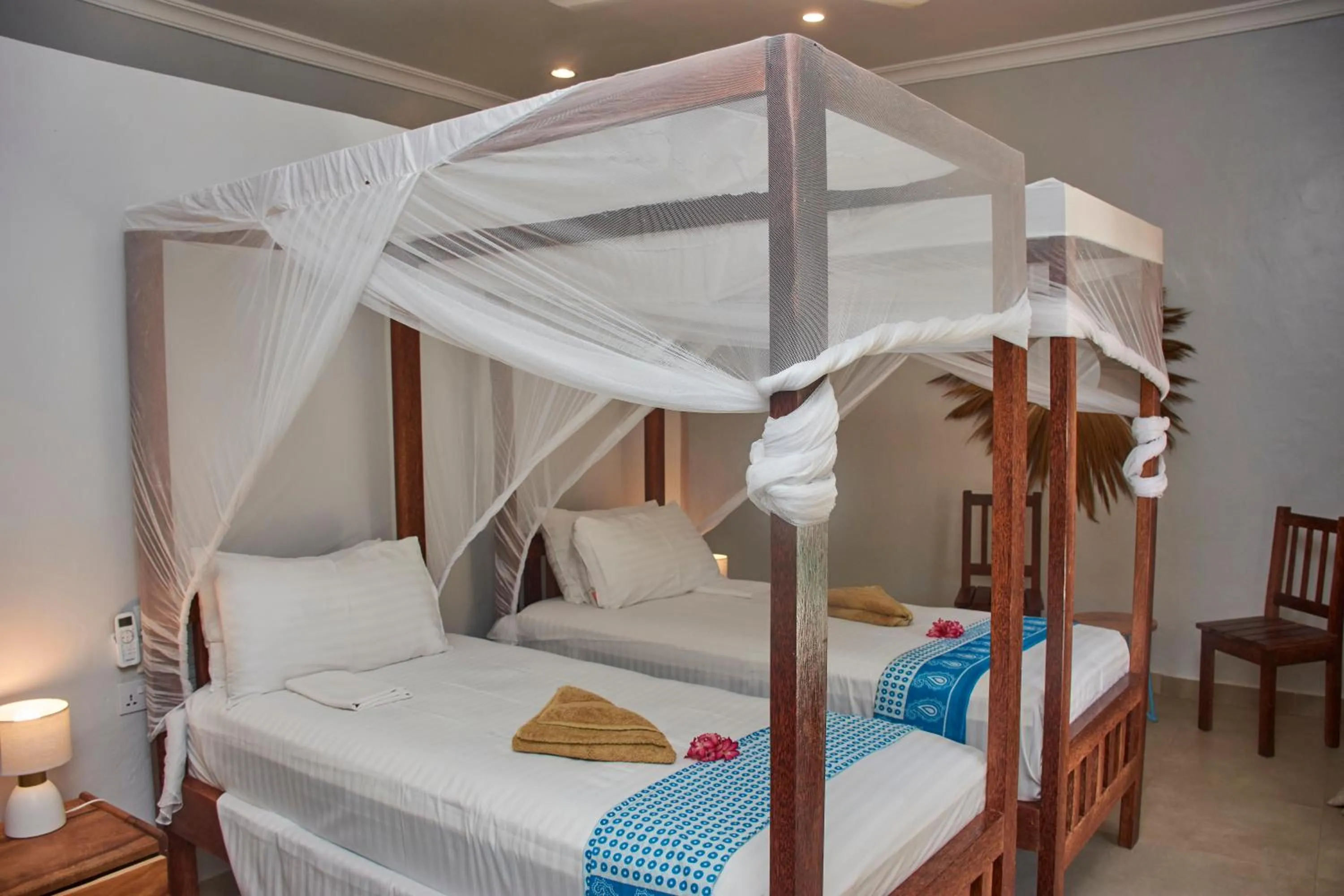 Bed in Paje Beach Apartments & Hotel