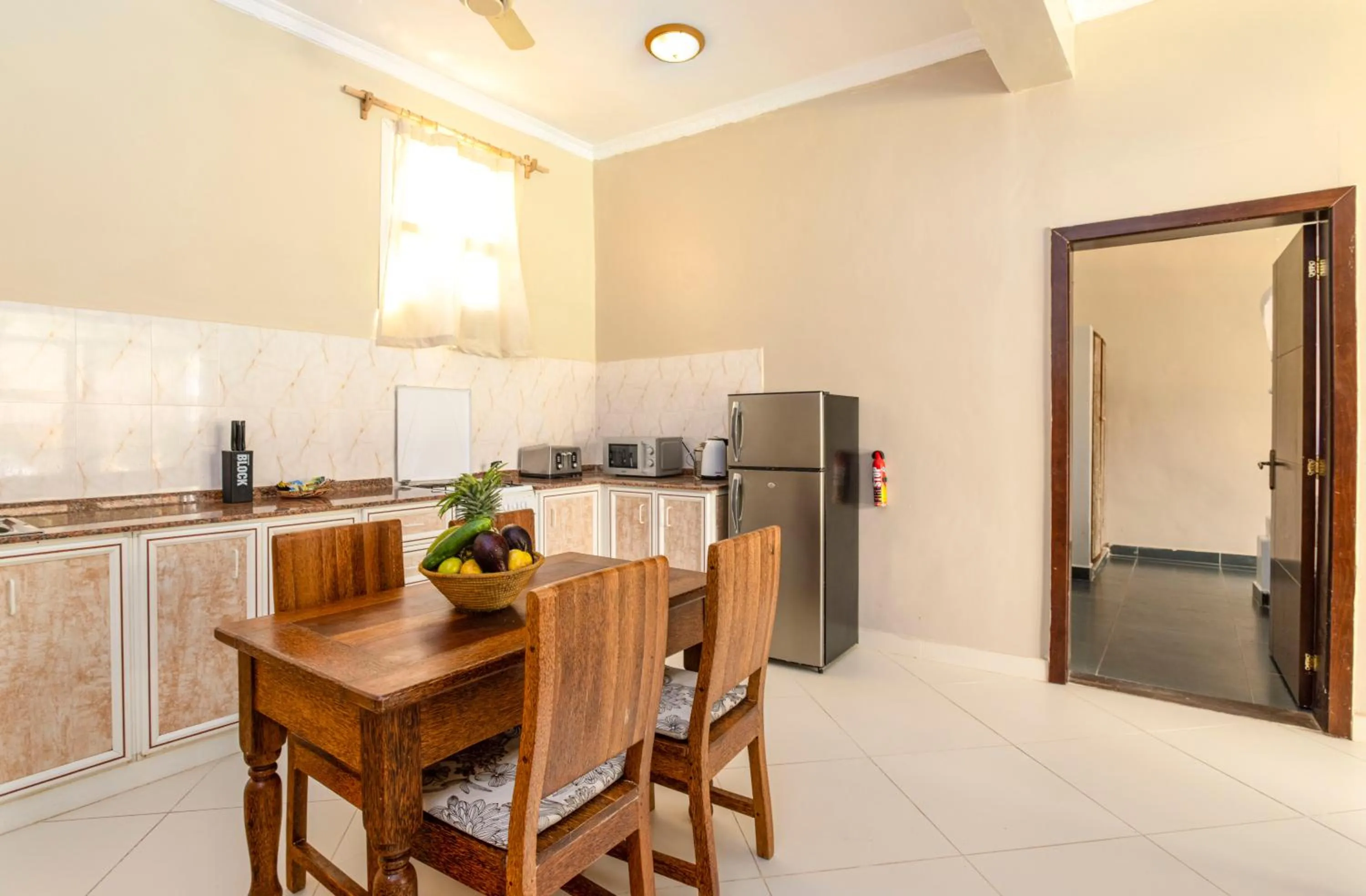 Kitchen or kitchenette in Paje Beach Apartments & Hotel