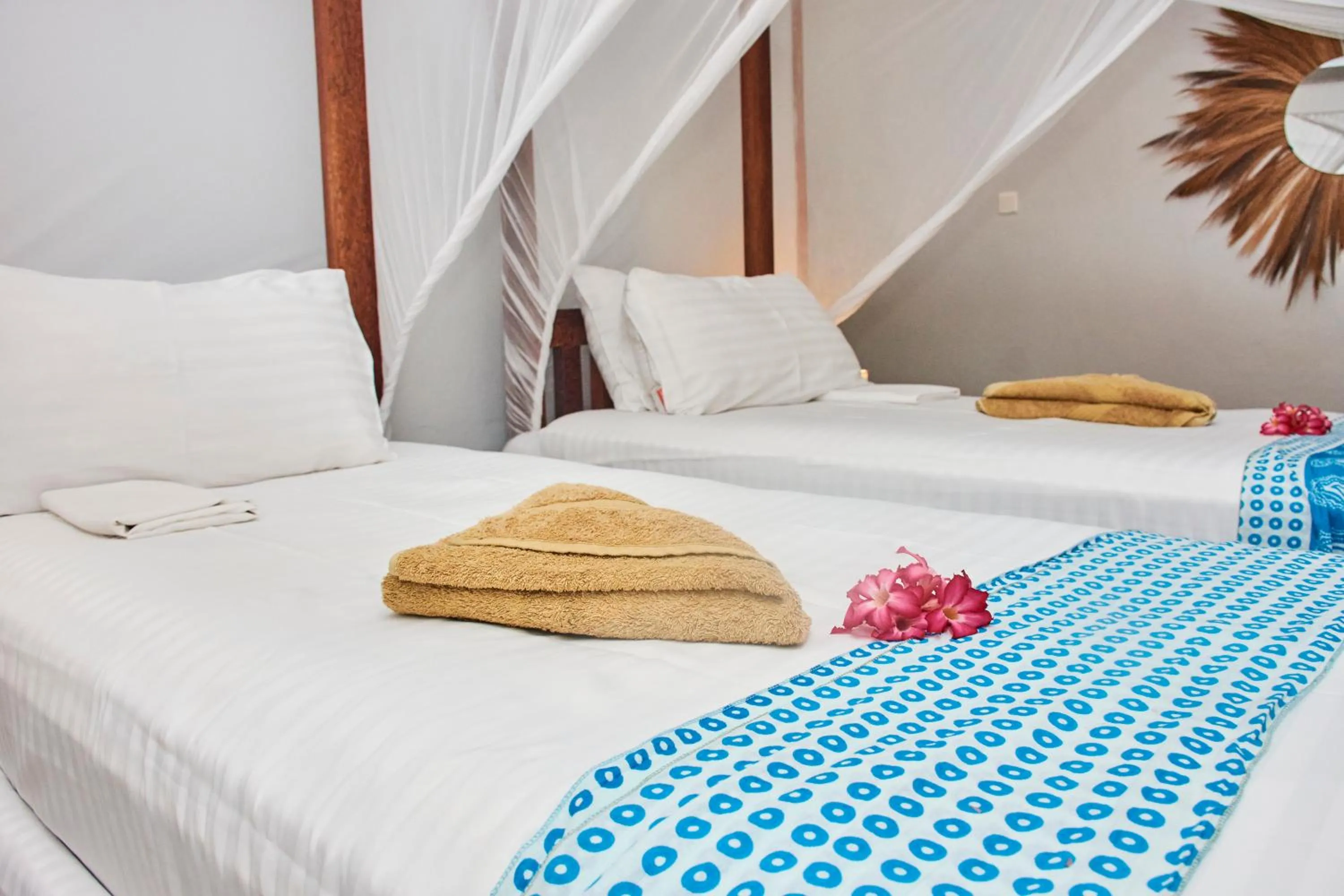 Bed in Paje Beach Apartments & Hotel