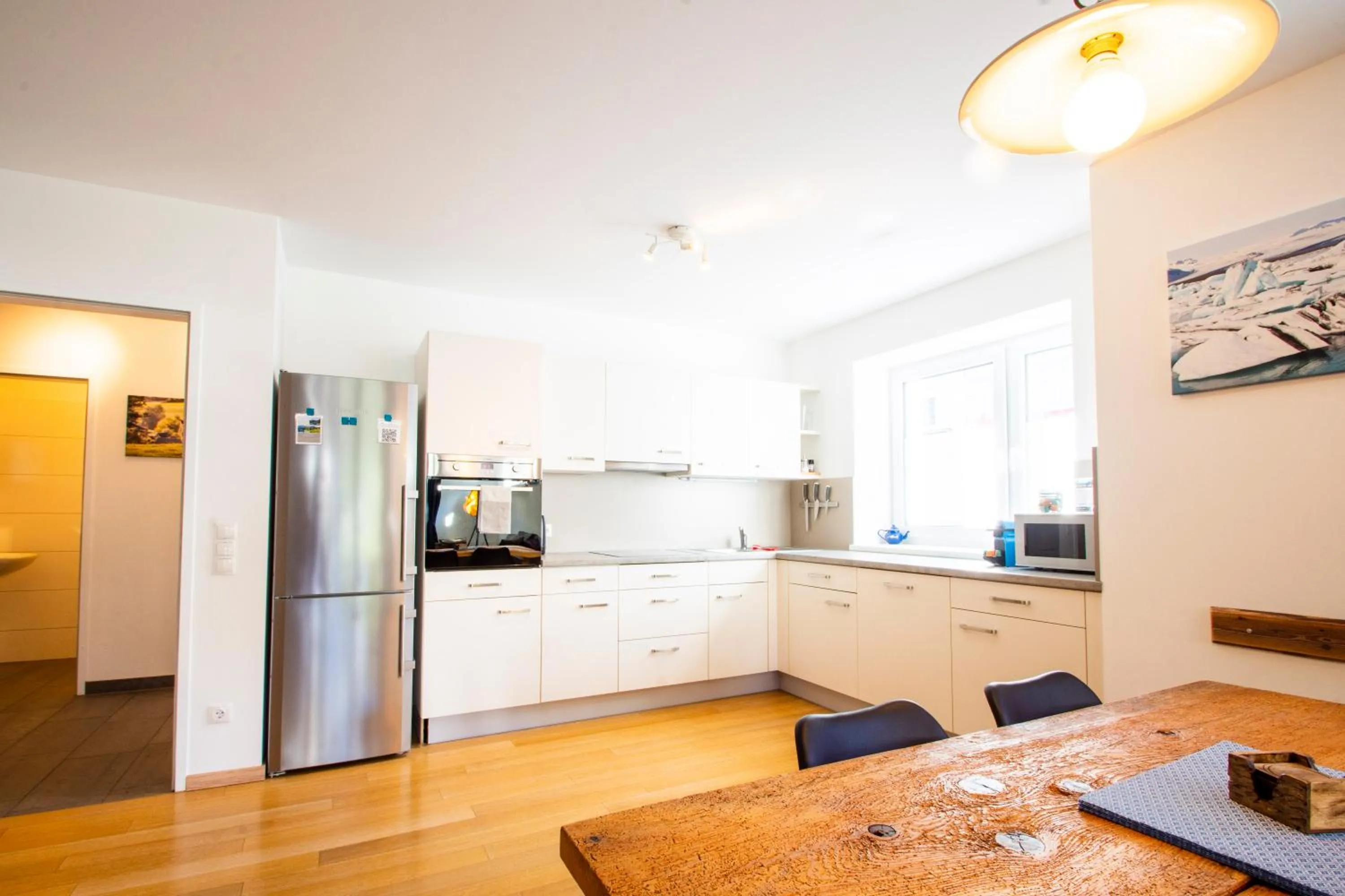 Kitchen or kitchenette in Fleischerei - Apartments, Cafe & Weinbar