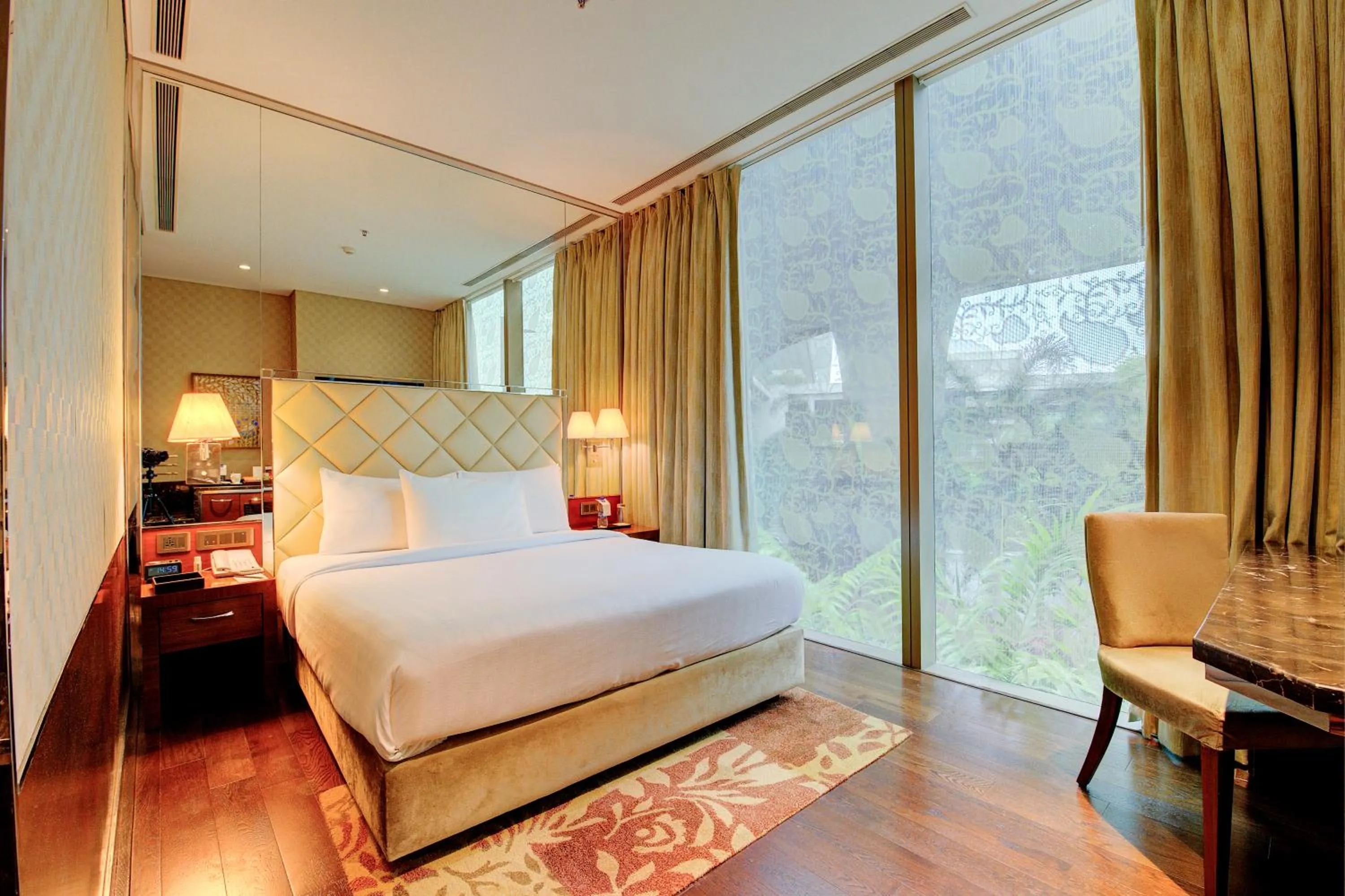 Photo of the whole room, Bed in Niranta Transit Hotel Mumbai Airport - At Arrivals