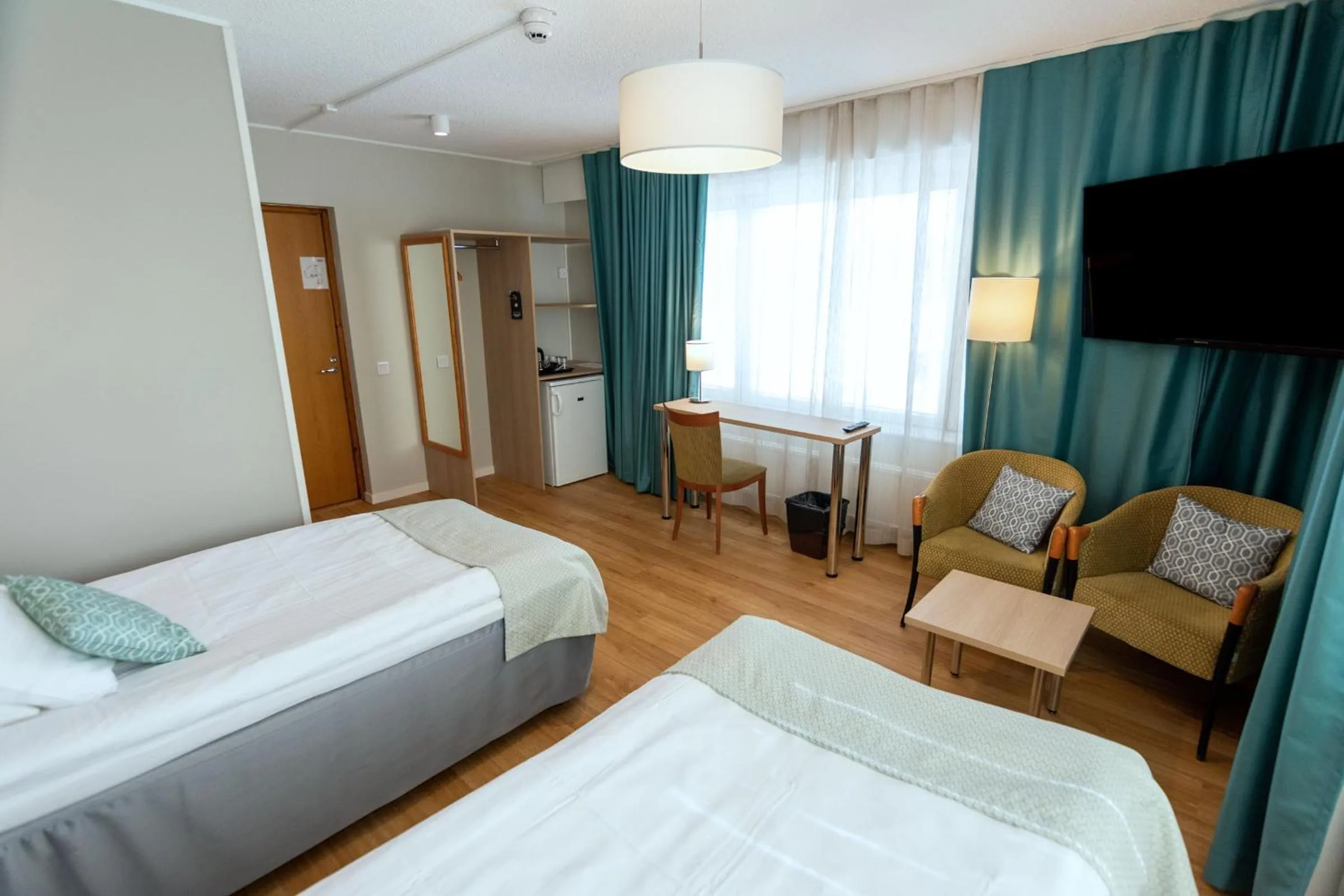 Photo of the whole room, Bed in Hotel Hirvi