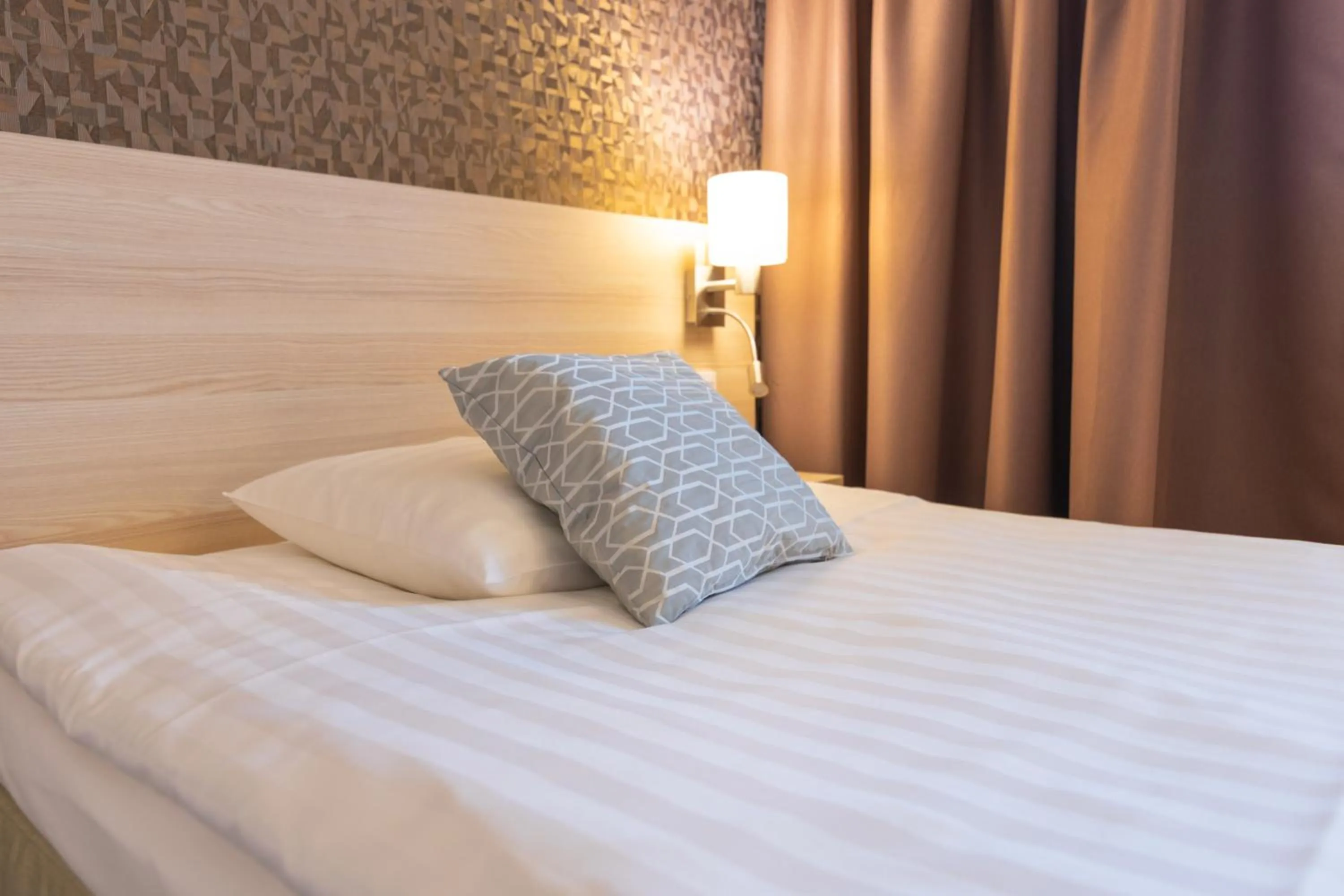 Decorative detail, Bed in Hotel Kivitasku