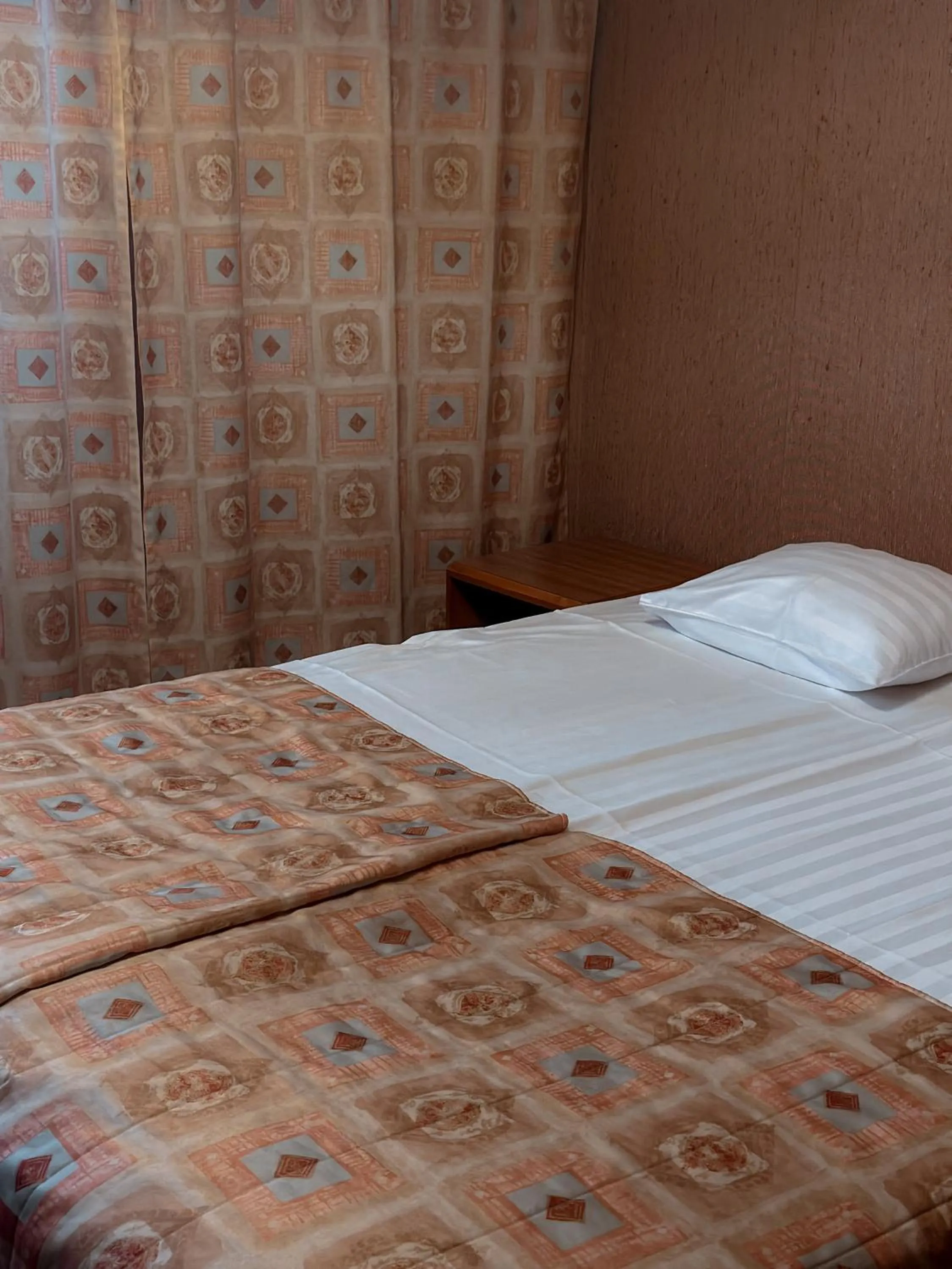 Bed in Hotel Sommelo