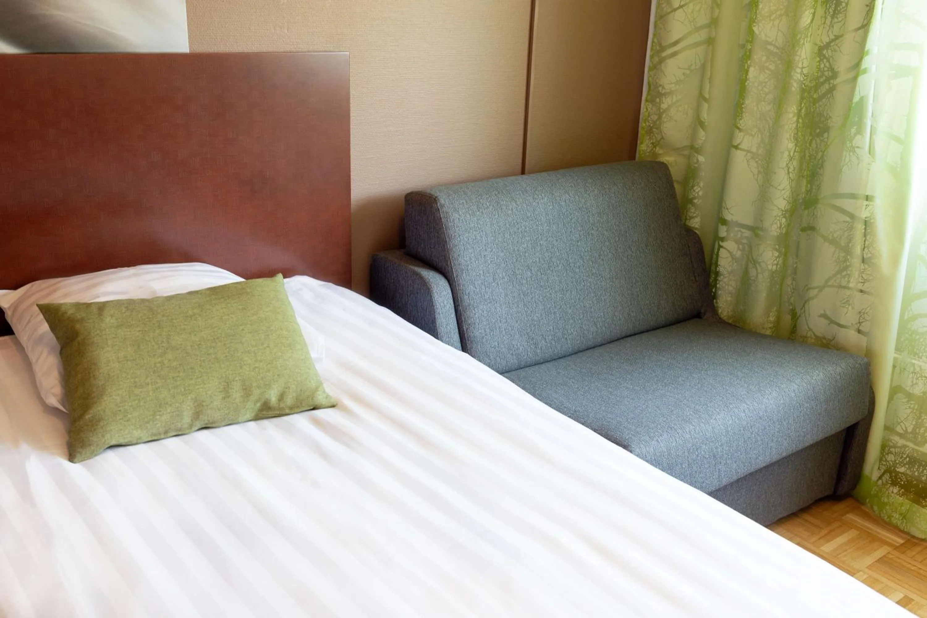 Photo of the whole room, Bed in Scandic Jyväskylä City