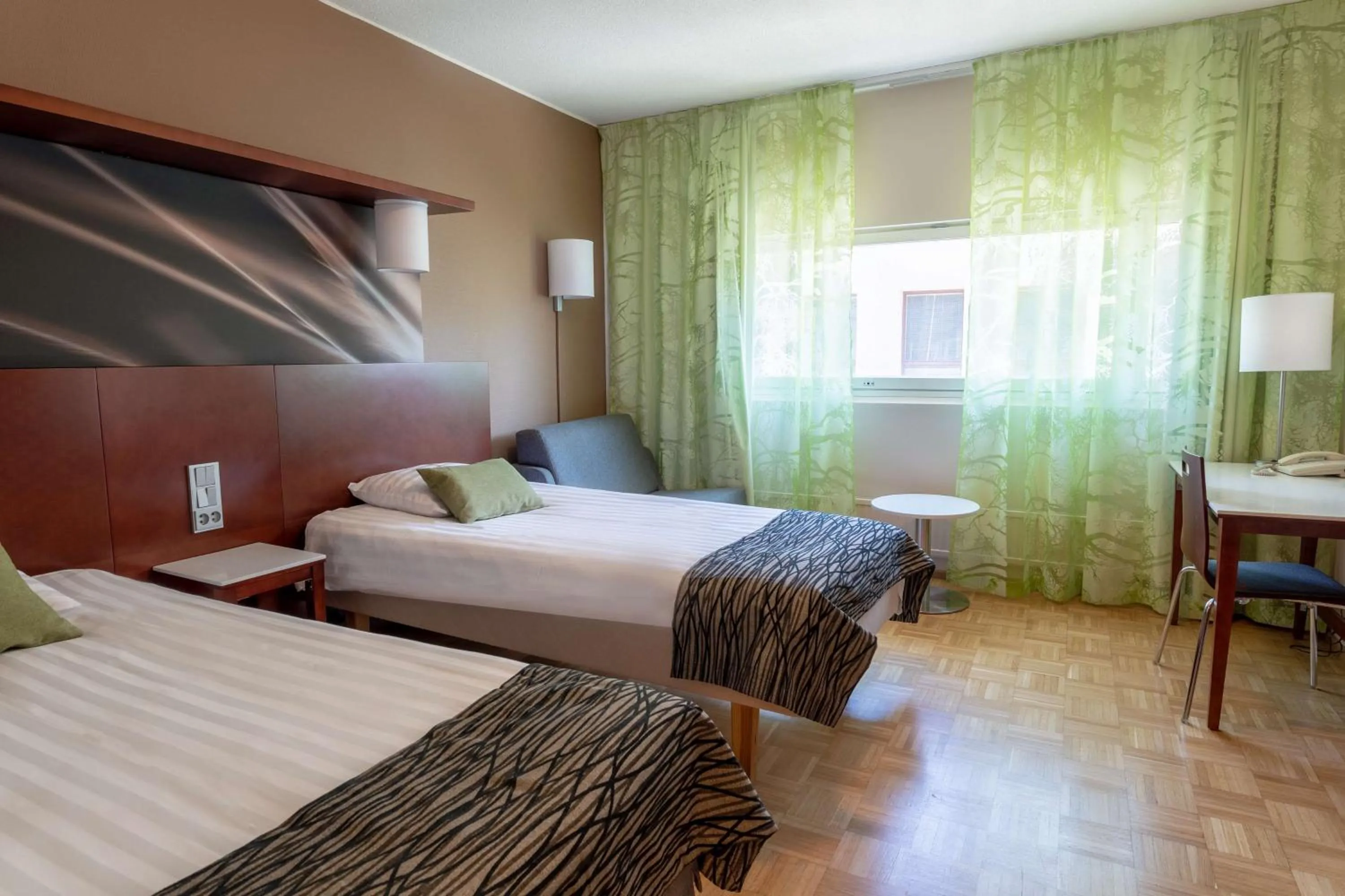 Photo of the whole room, Bed in Scandic Jyväskylä City