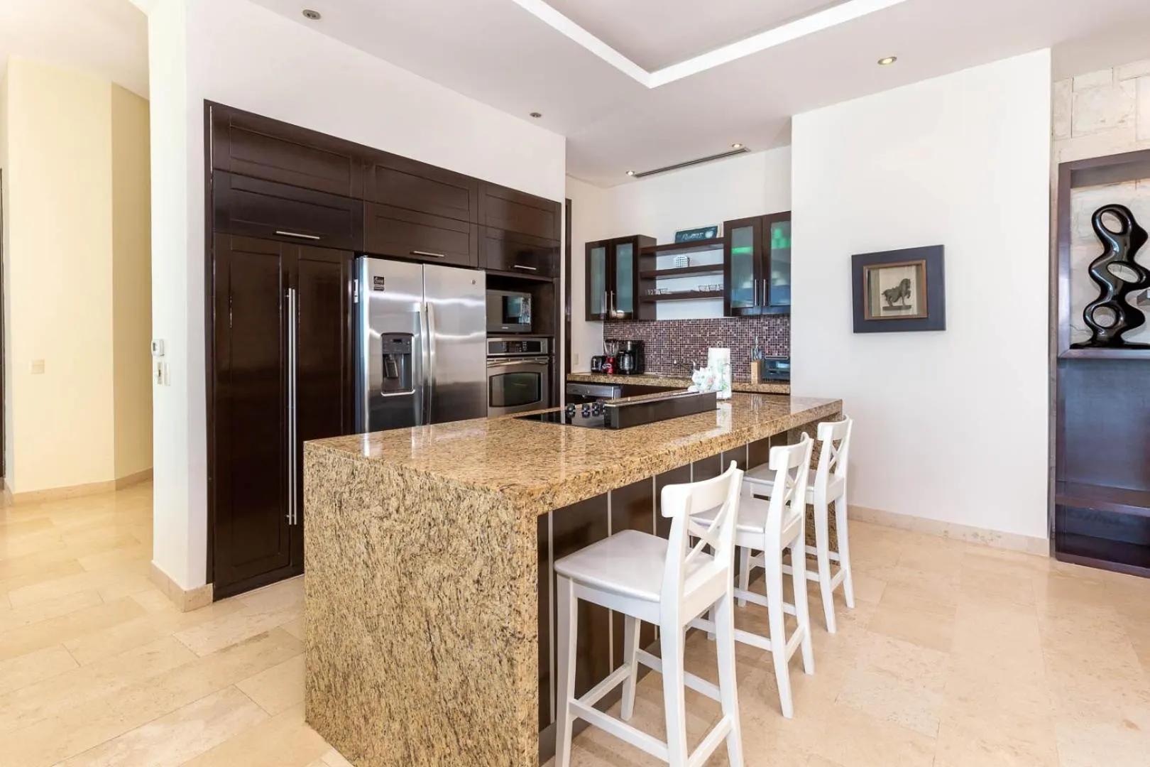 Kitchen or kitchenette in Encanto Living Penthouse by Kivoya