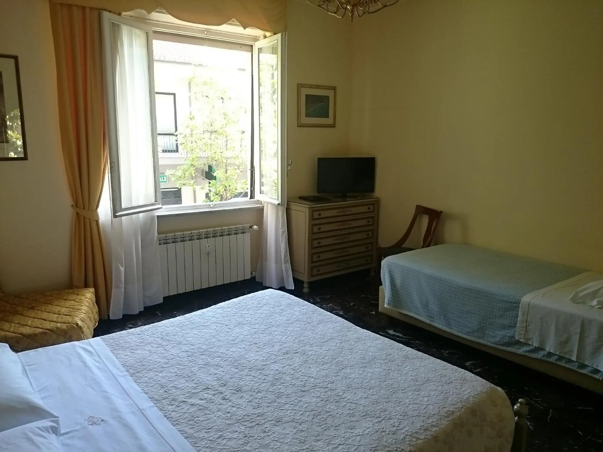 Photo of the whole room, Bed in Hotel Pescetto