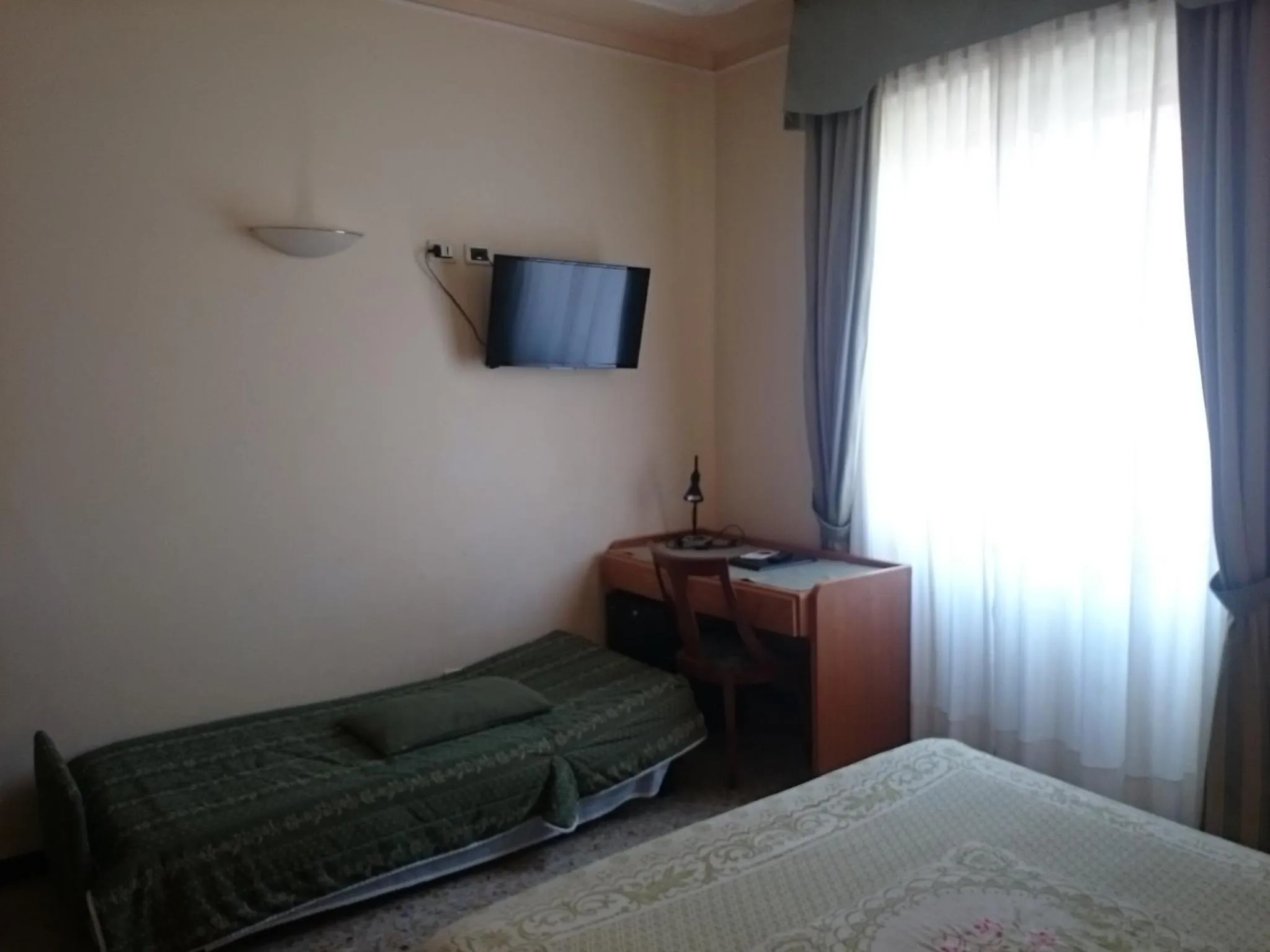 Photo of the whole room, Bed in Hotel Pescetto