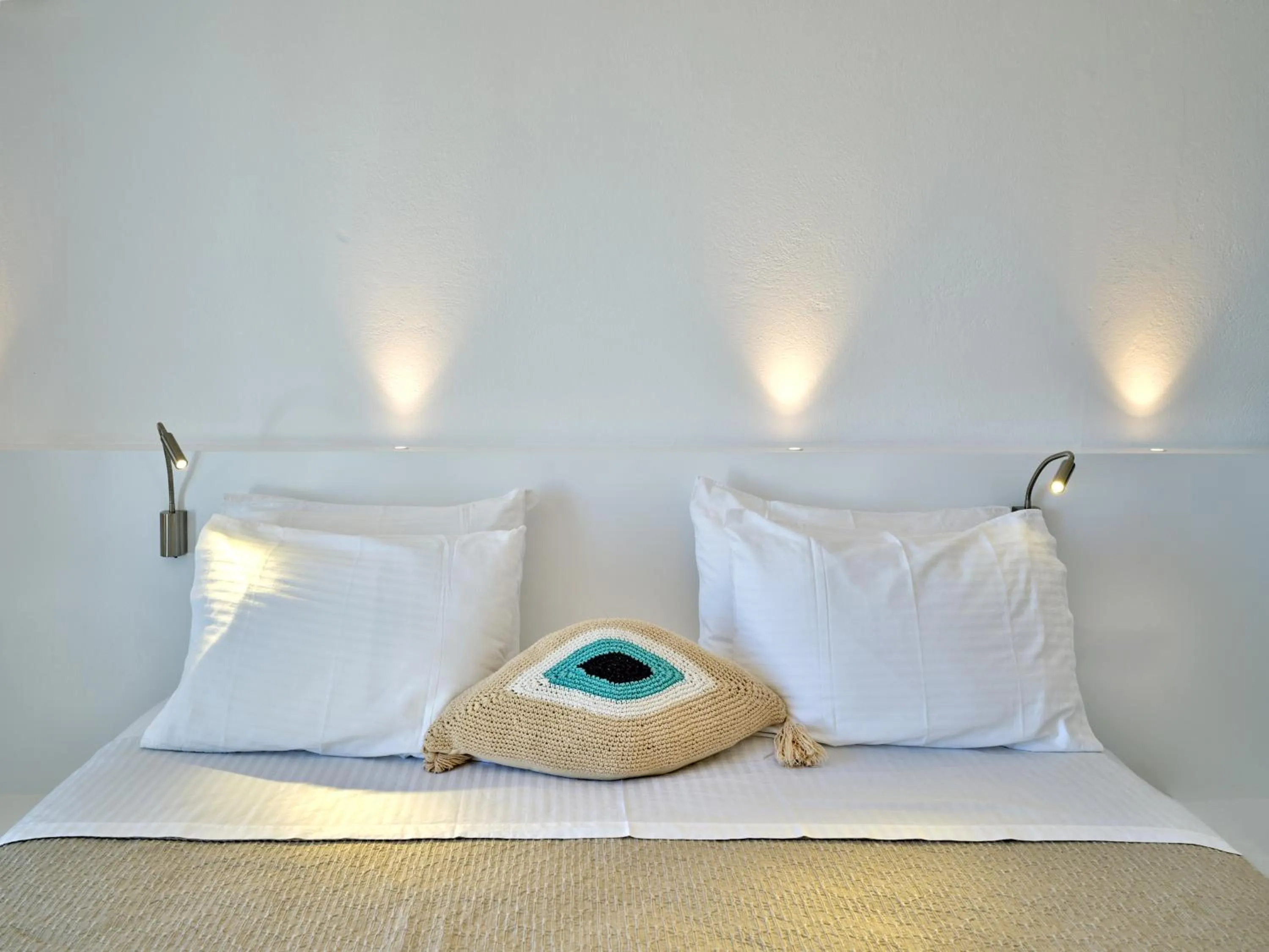 Bed in Kanale's Rooms & Suites