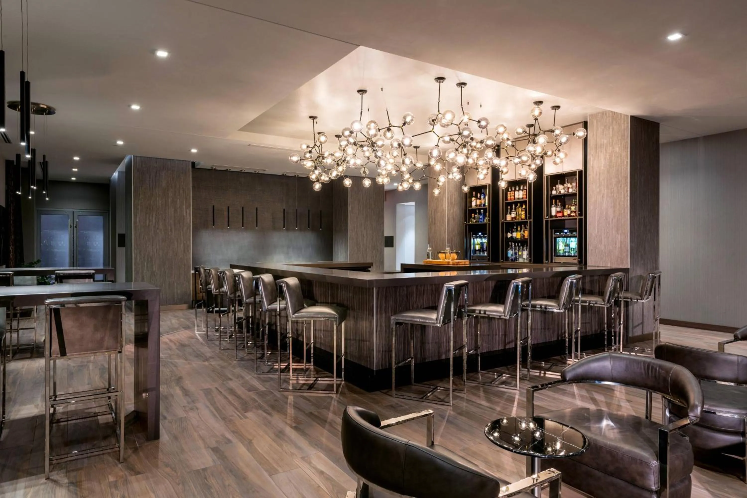 Lounge or bar in AC Hotel by Marriott Boston Cambridge