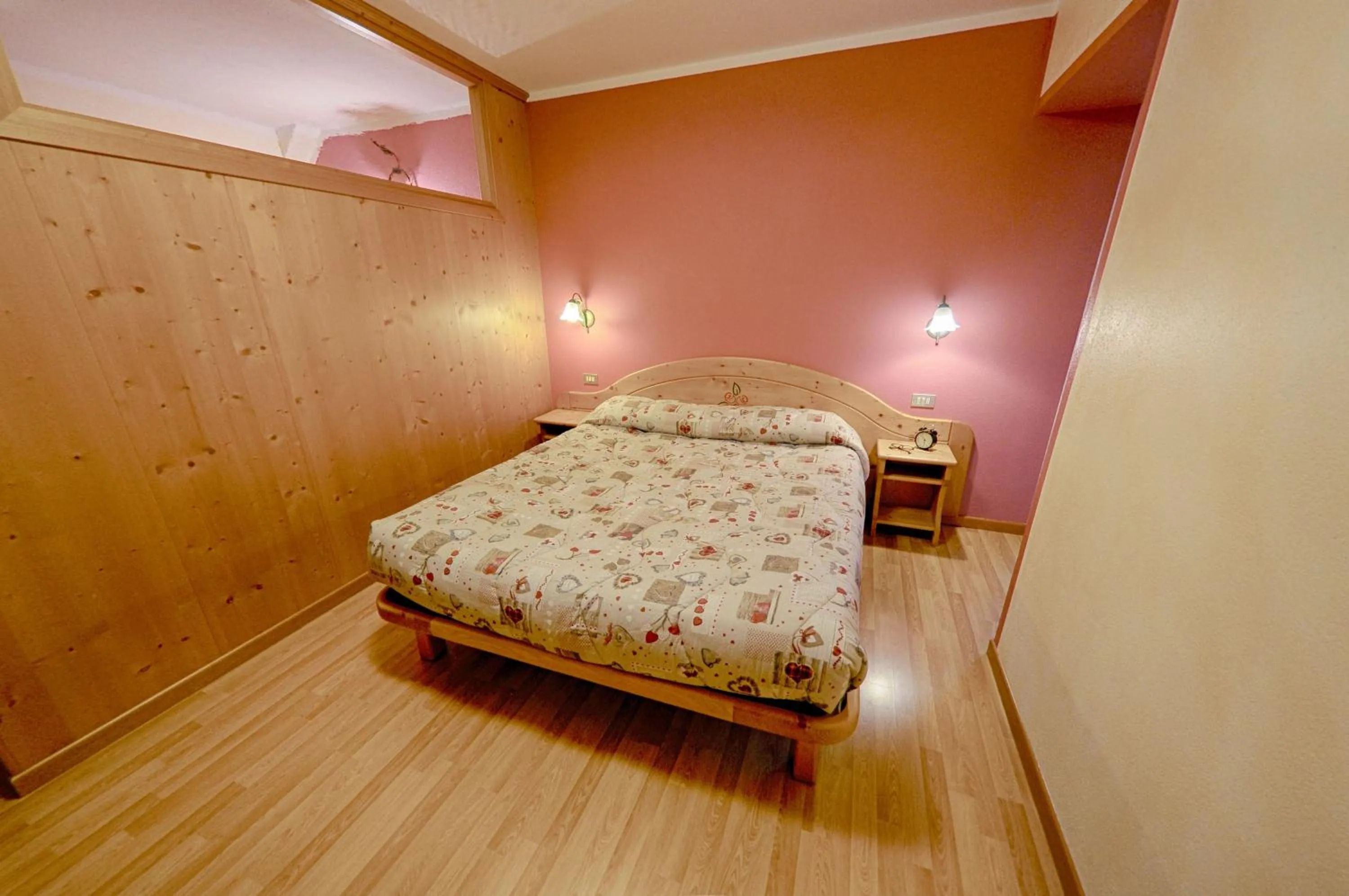 Bed in Rosengarden Alpine Residence