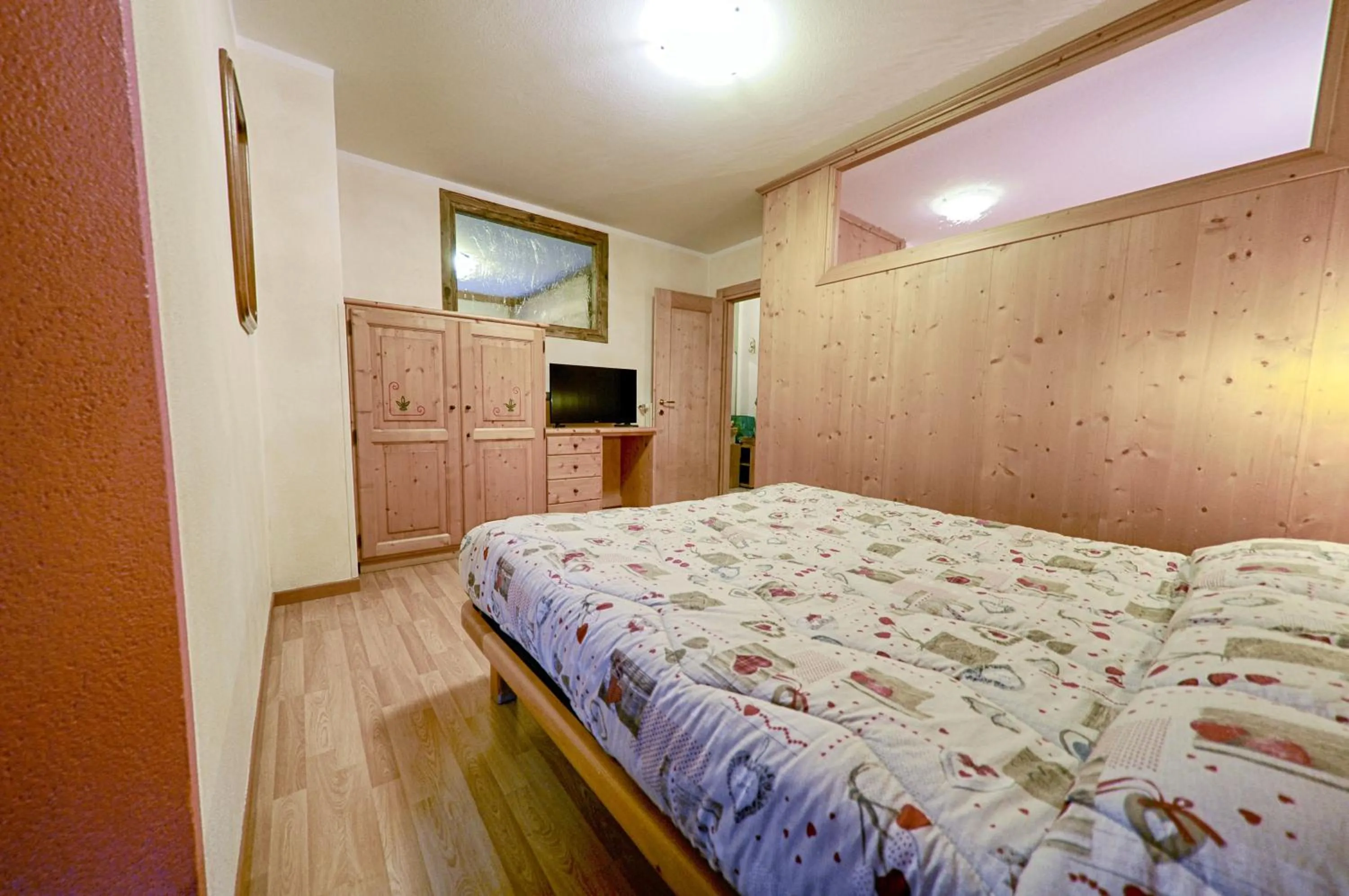 Bed in Rosengarden Alpine Residence