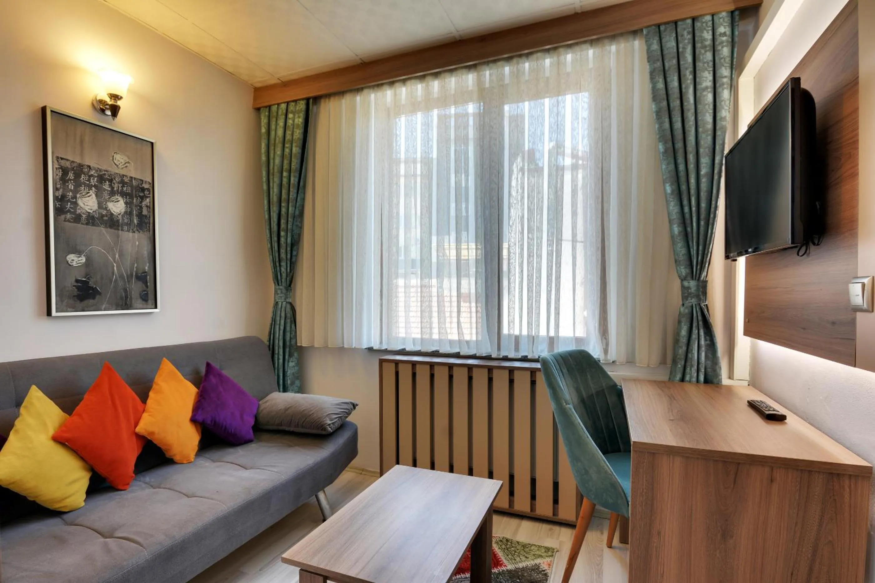 Communal lounge/ TV room in Grande Stella Hotel