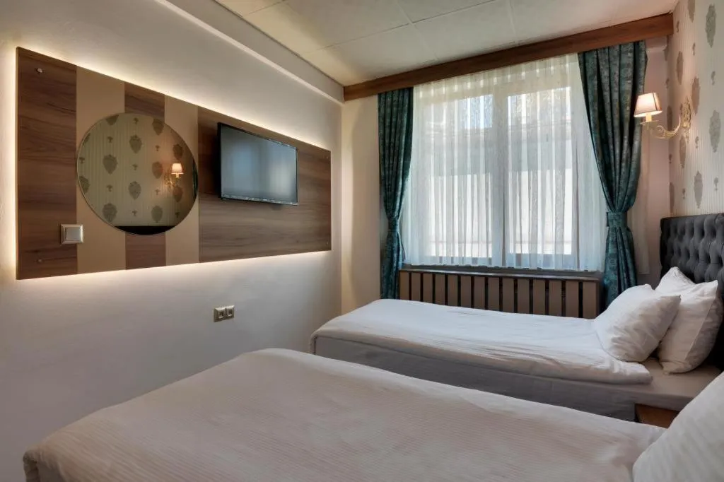 Bedroom, Bed in Grande Stella Hotel