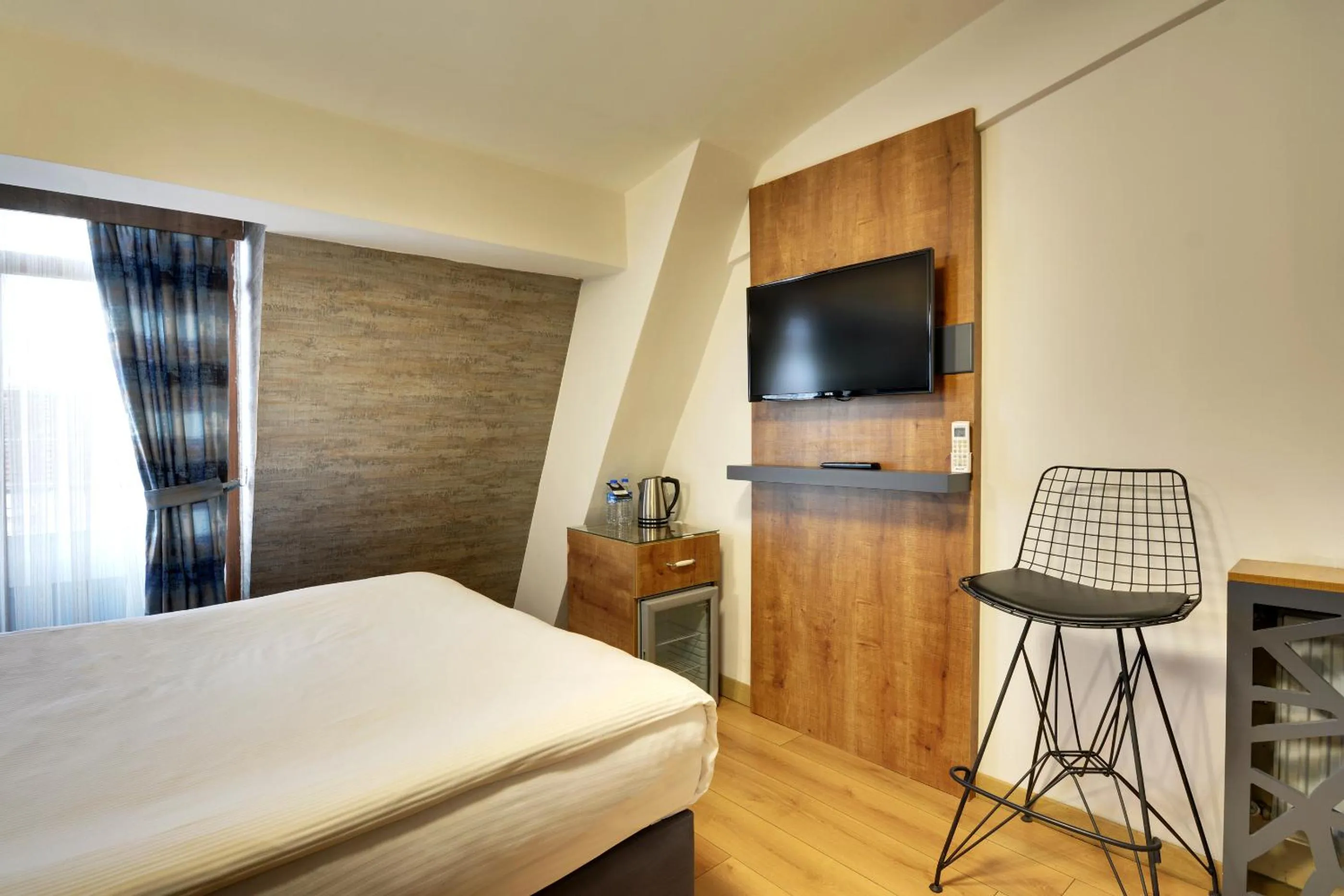 Bed in Grande Stella Hotel