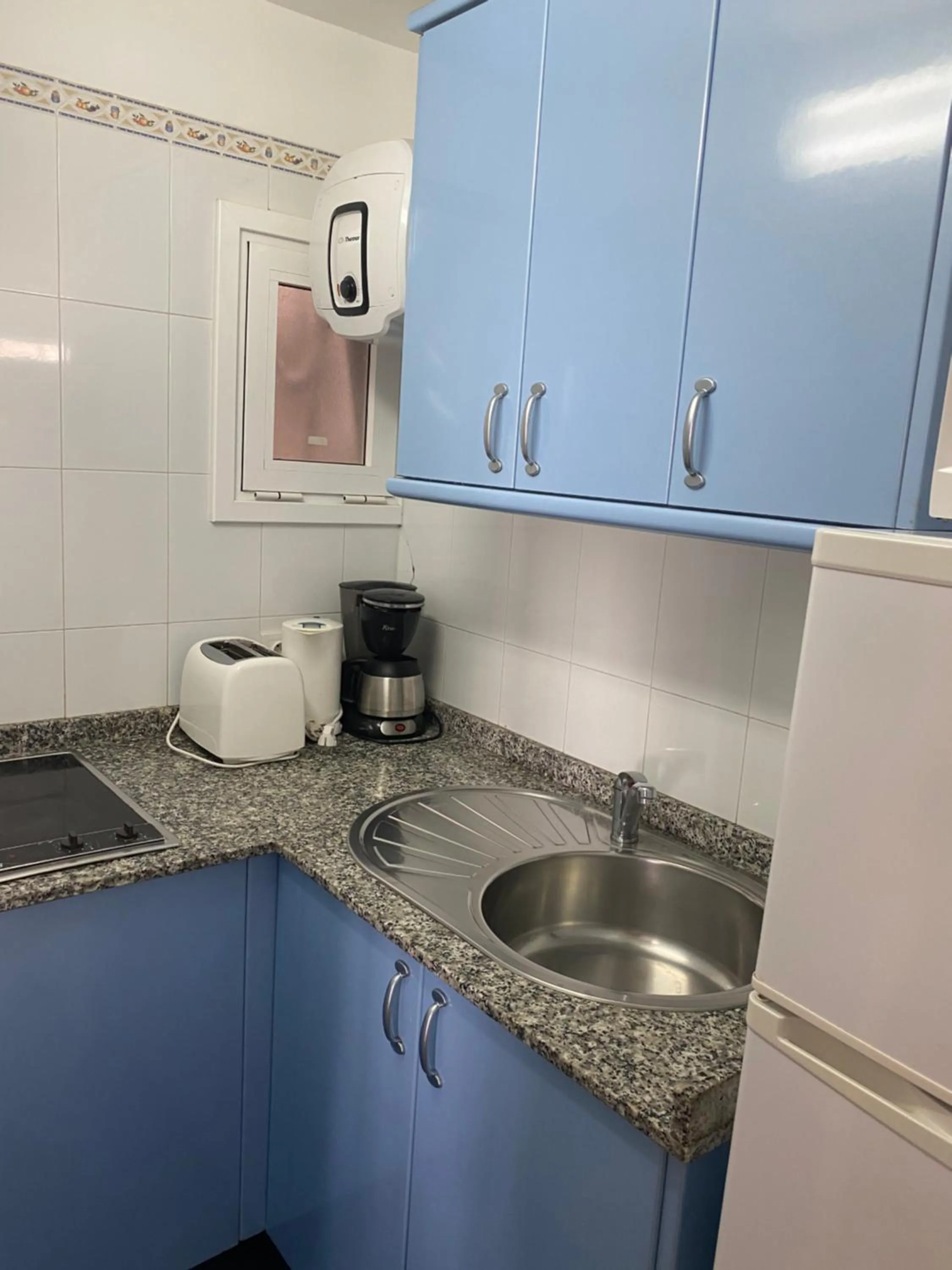 Kitchen/Kitchenette in Apartamentos Maspalomas Oasis