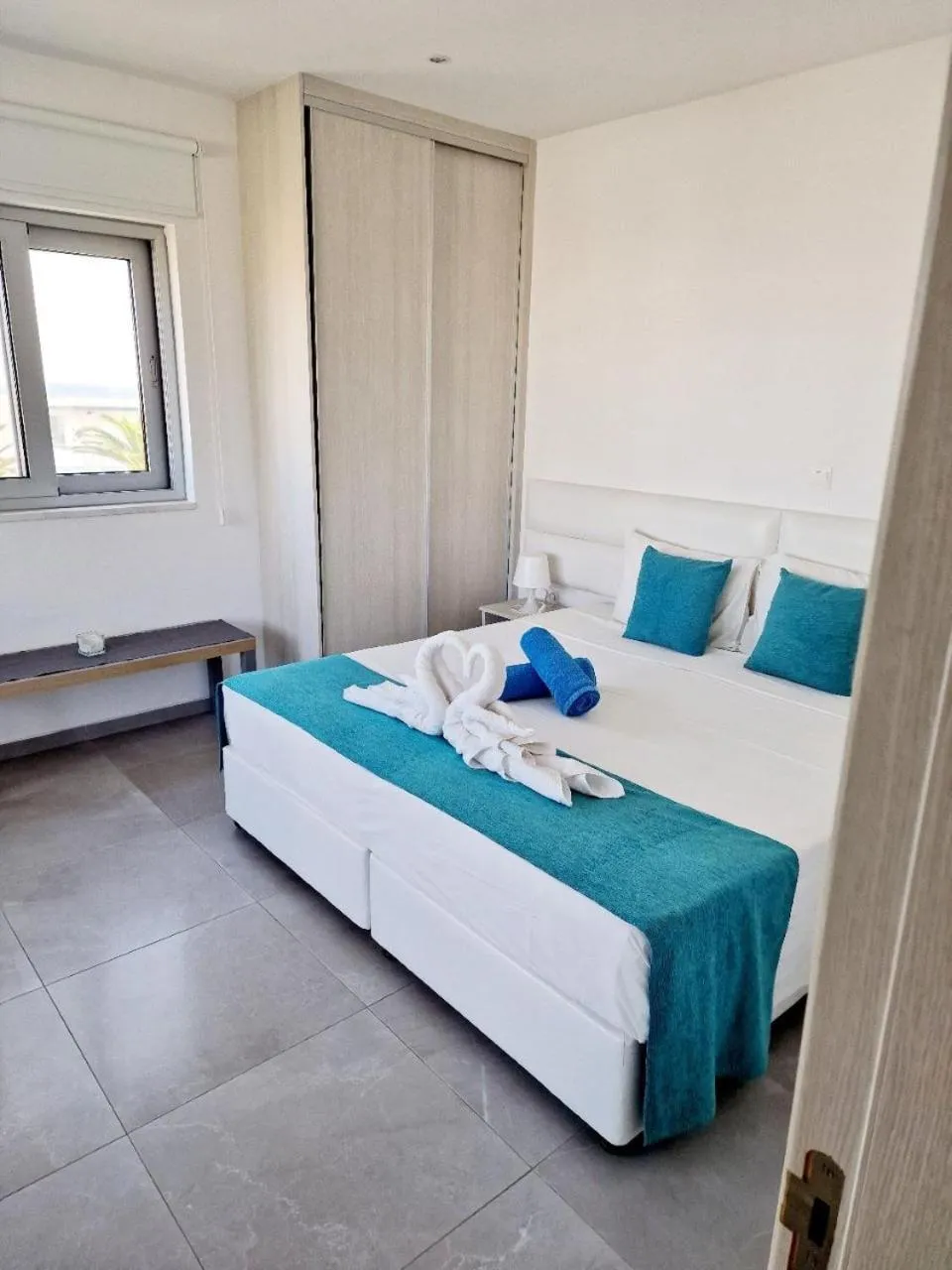 Bed in Christopher's Sandy Beach Suites