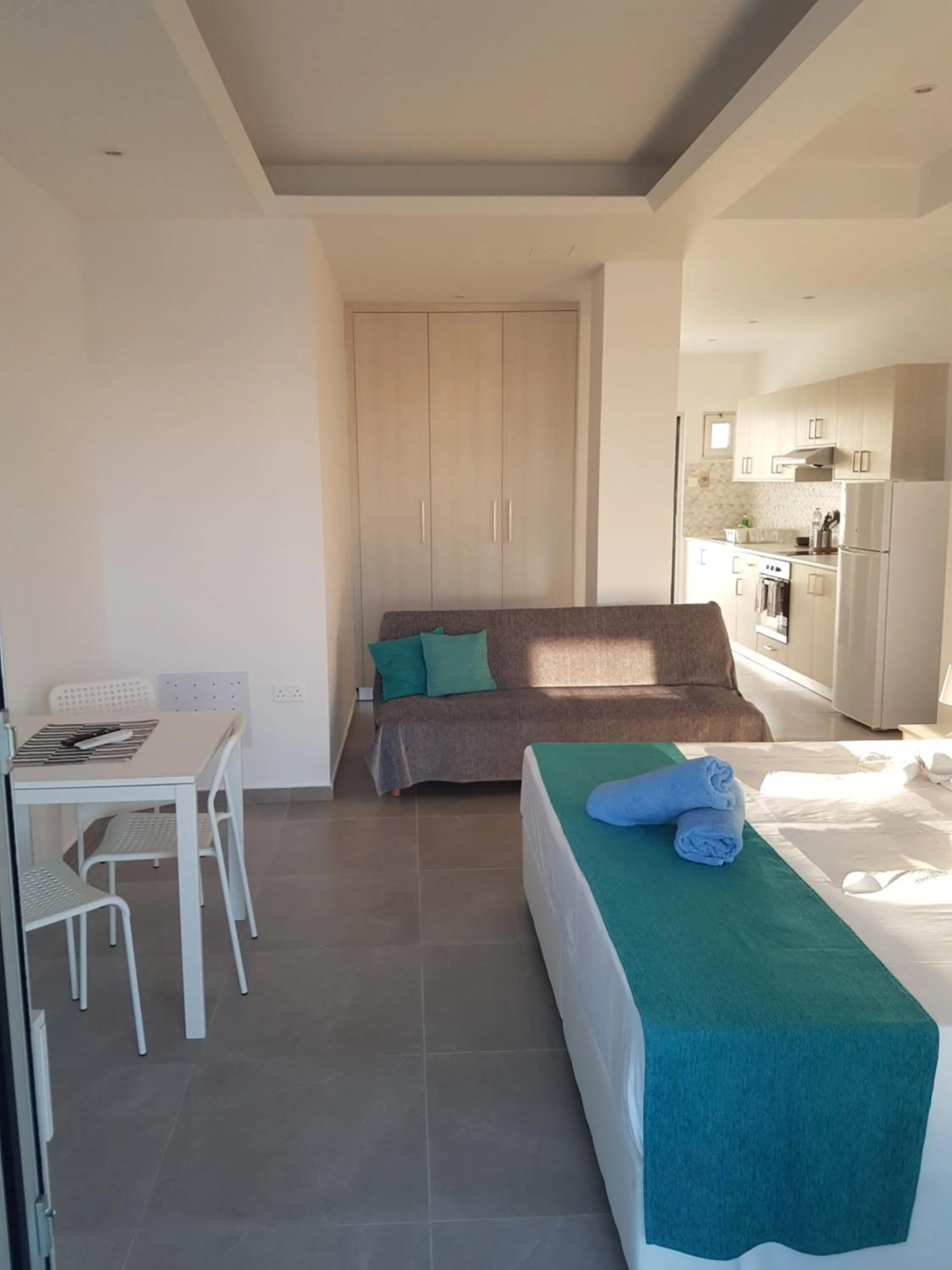 Bed in Christopher's Sandy Beach Suites