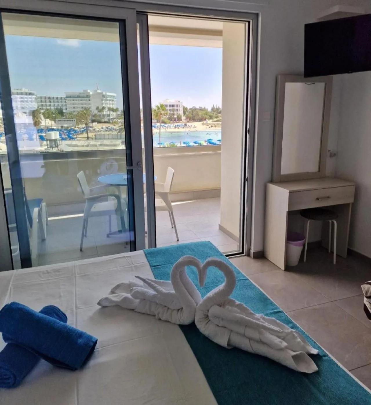 Bed in Christopher's Sandy Beach Suites