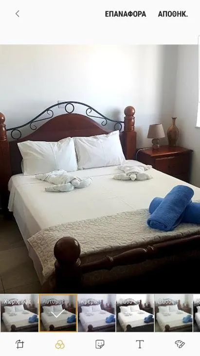 Bed in Christopher's Sandy Beach Suites